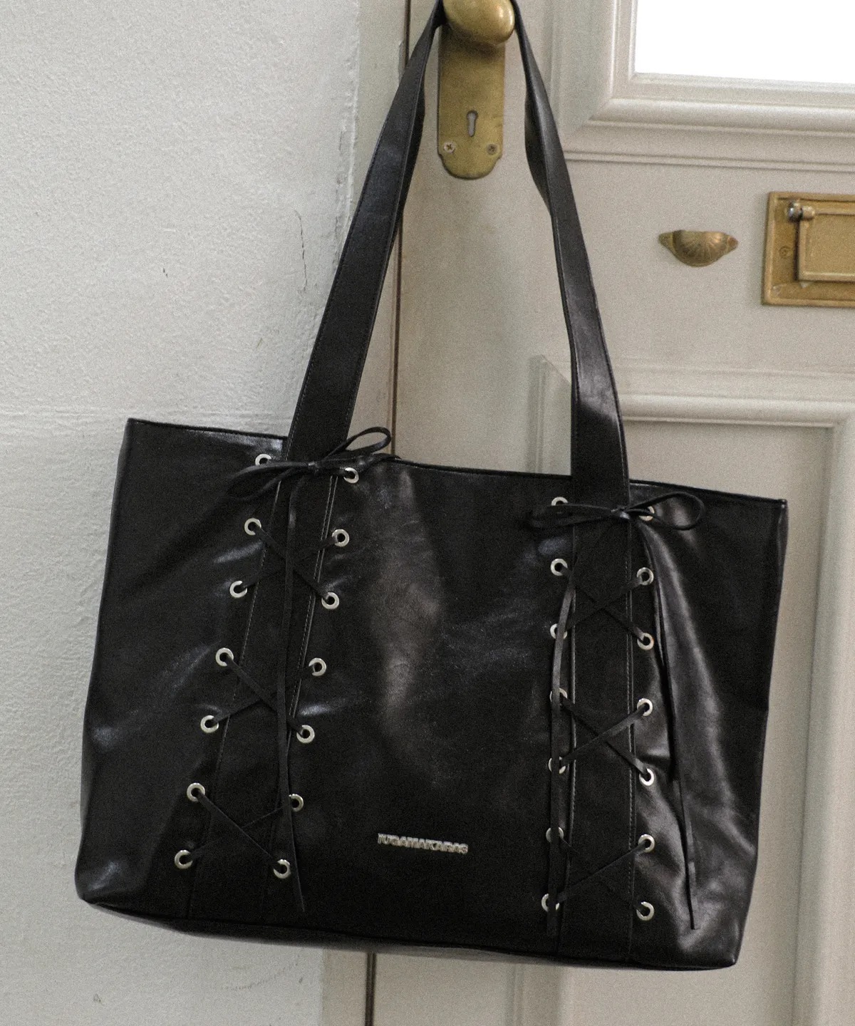 IUGAMAKARAS Eyelet Ribbon Leather Shoulder Bag