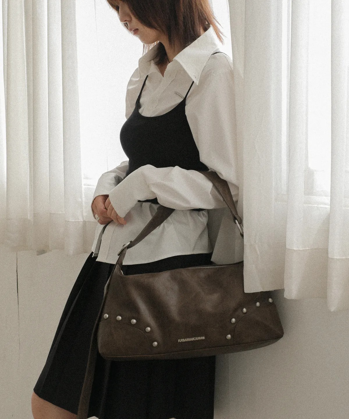 IUGAMAKARAS Studded Hobo Bag