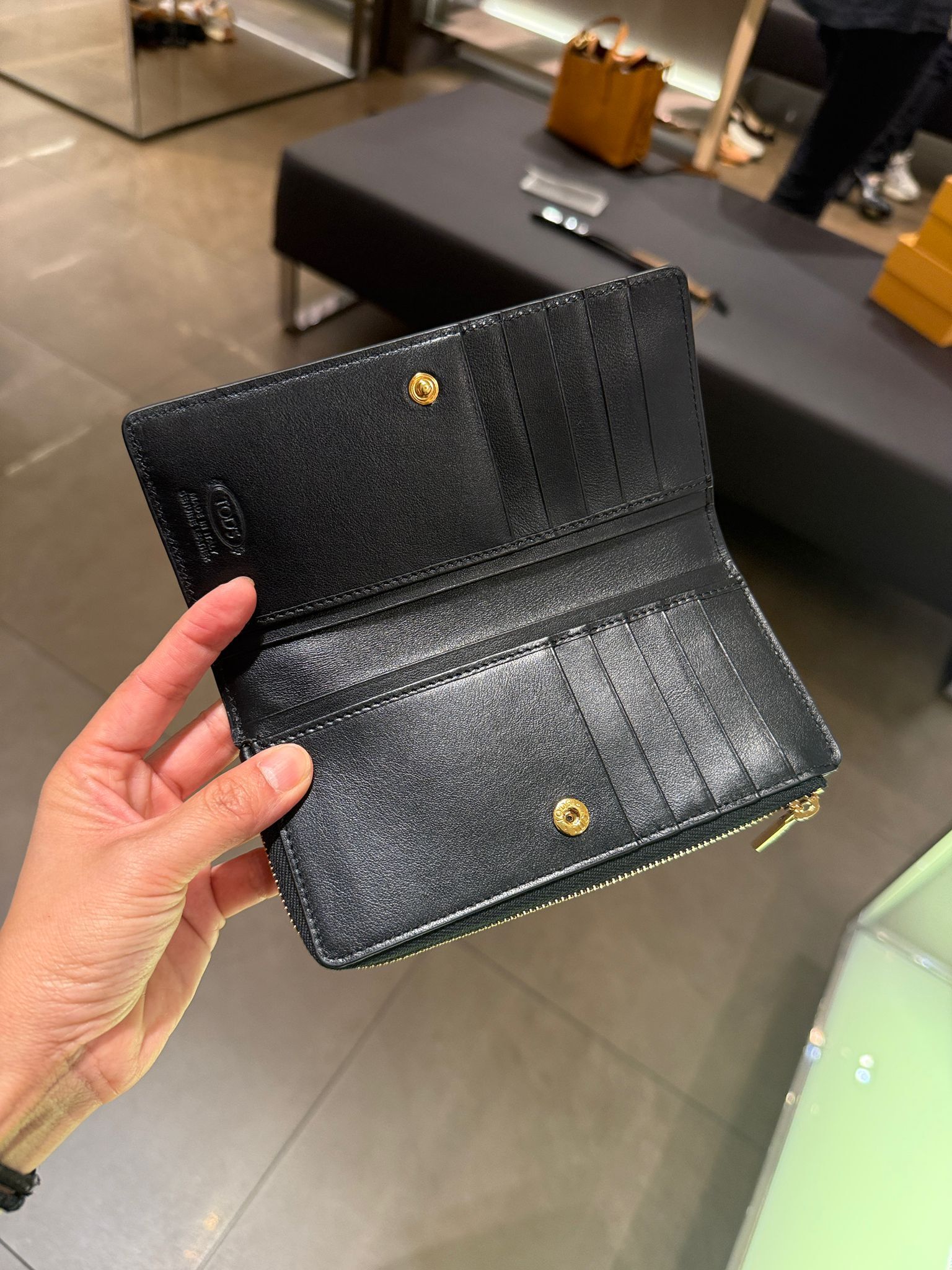 Tods TSV New Carte T logo Zip around long wallet Black