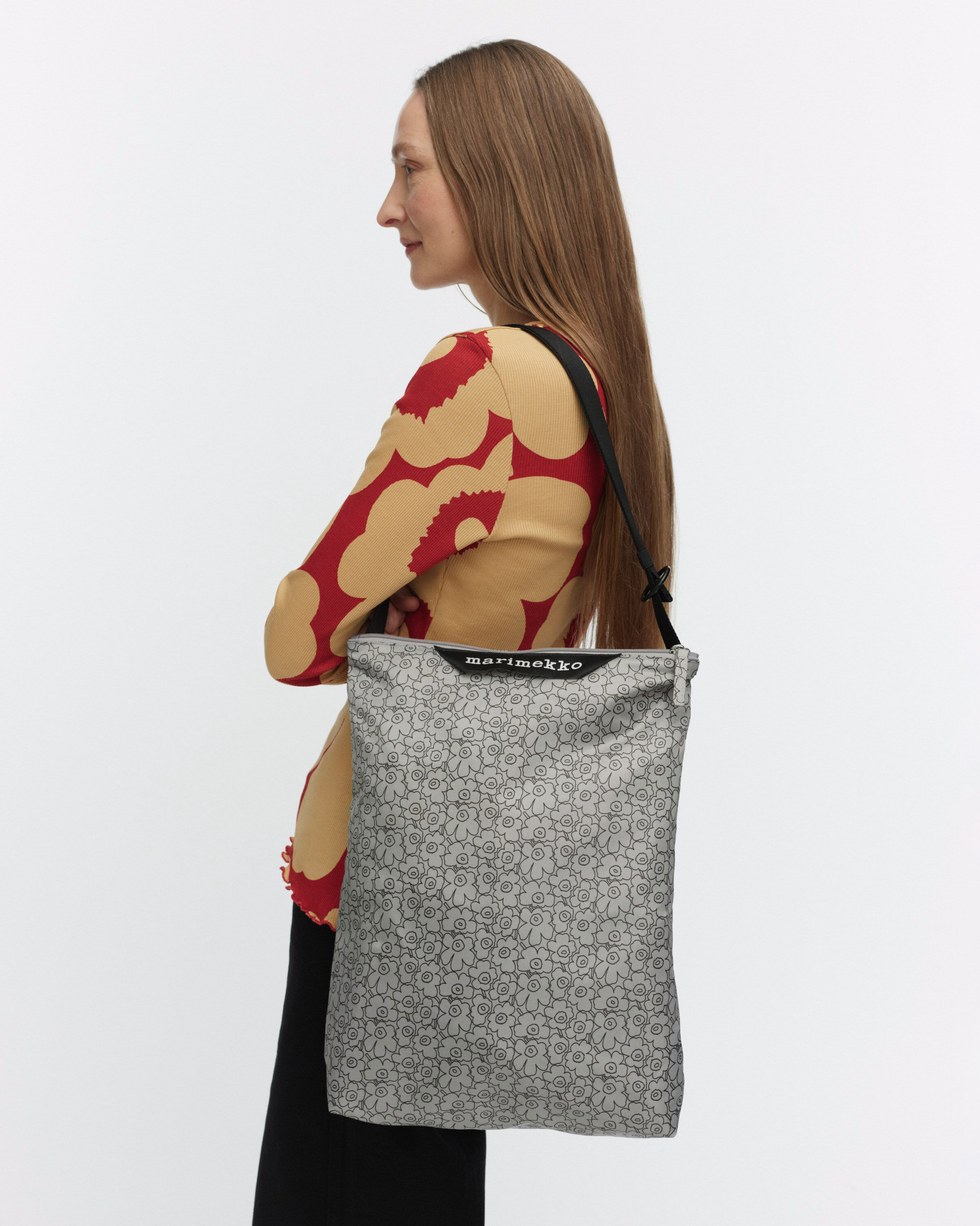 NEAT CROSSBODY PIIRTO UNIKKO M 肩背包