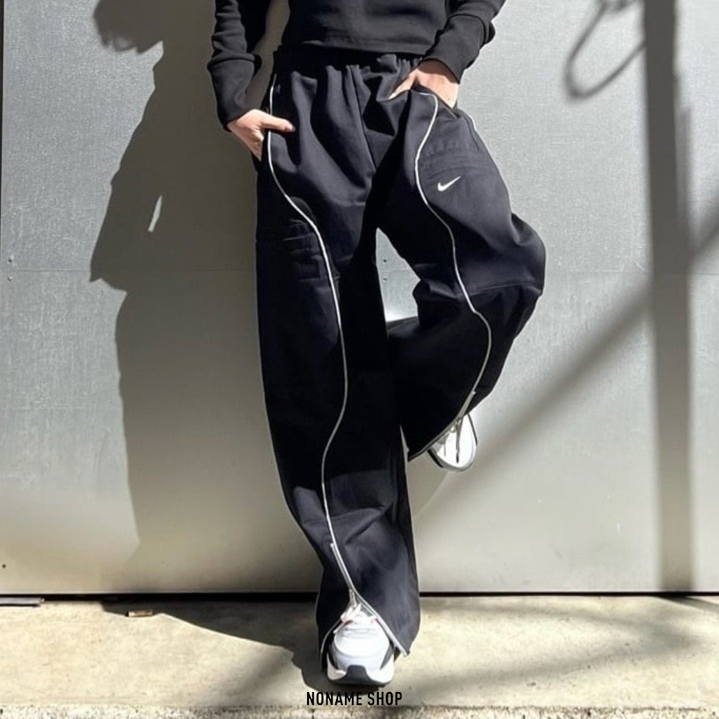 NIKE SPORTSWEAR 梭織  闊腿褲 不規則 線條 長褲 黑色 (女款)