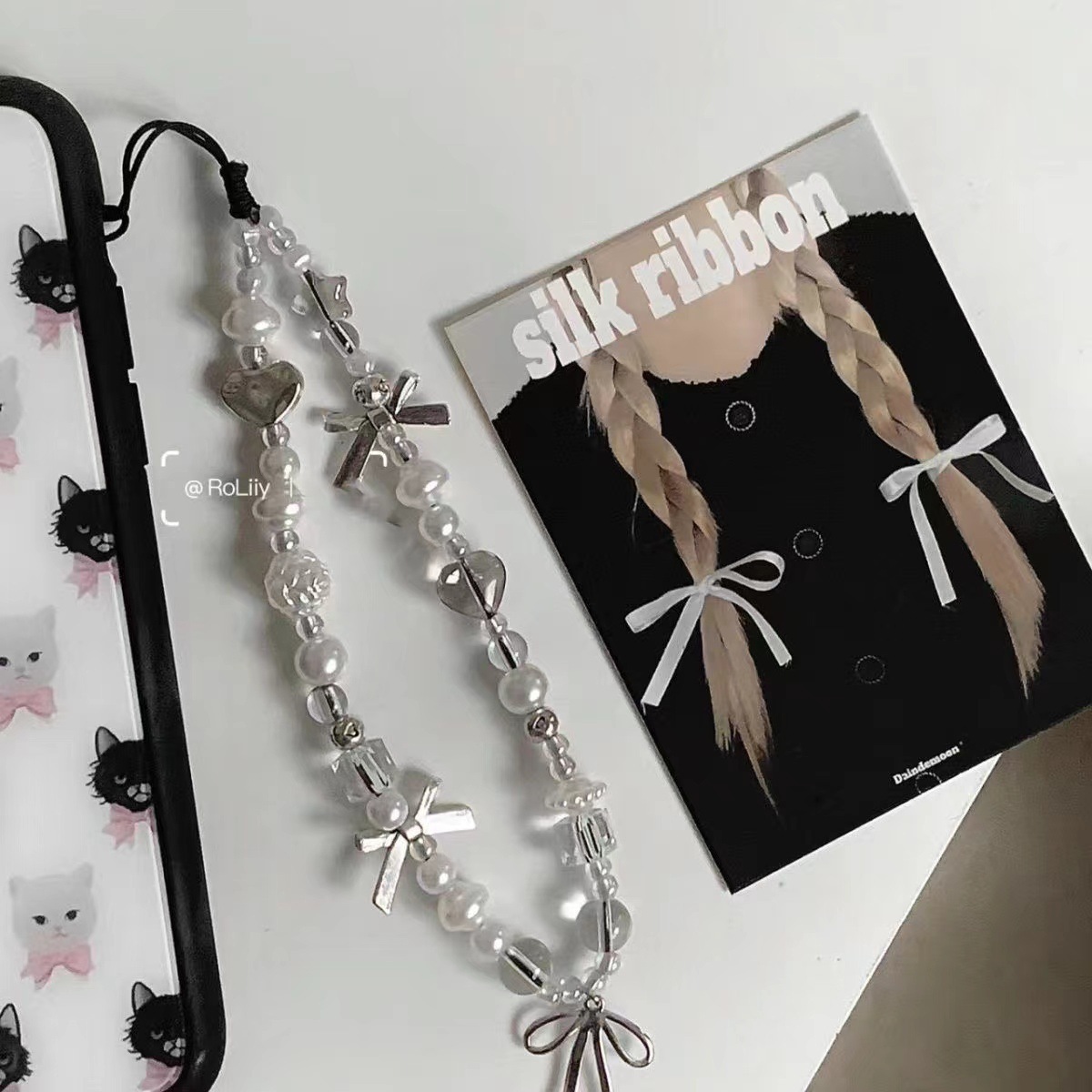 冷淡風銀色蝴蝶結手機鍊