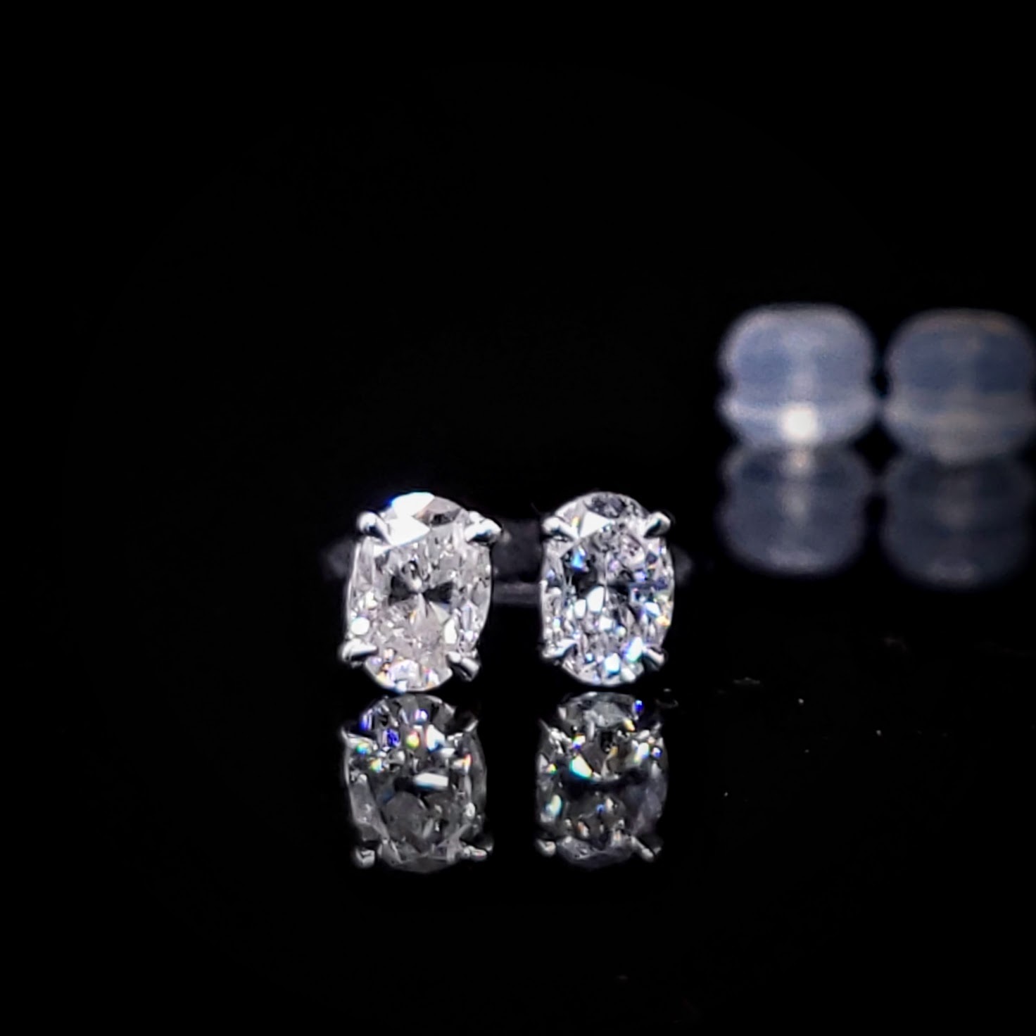 18K White Gold 0.71ct Oval Cut Diamond Earrings