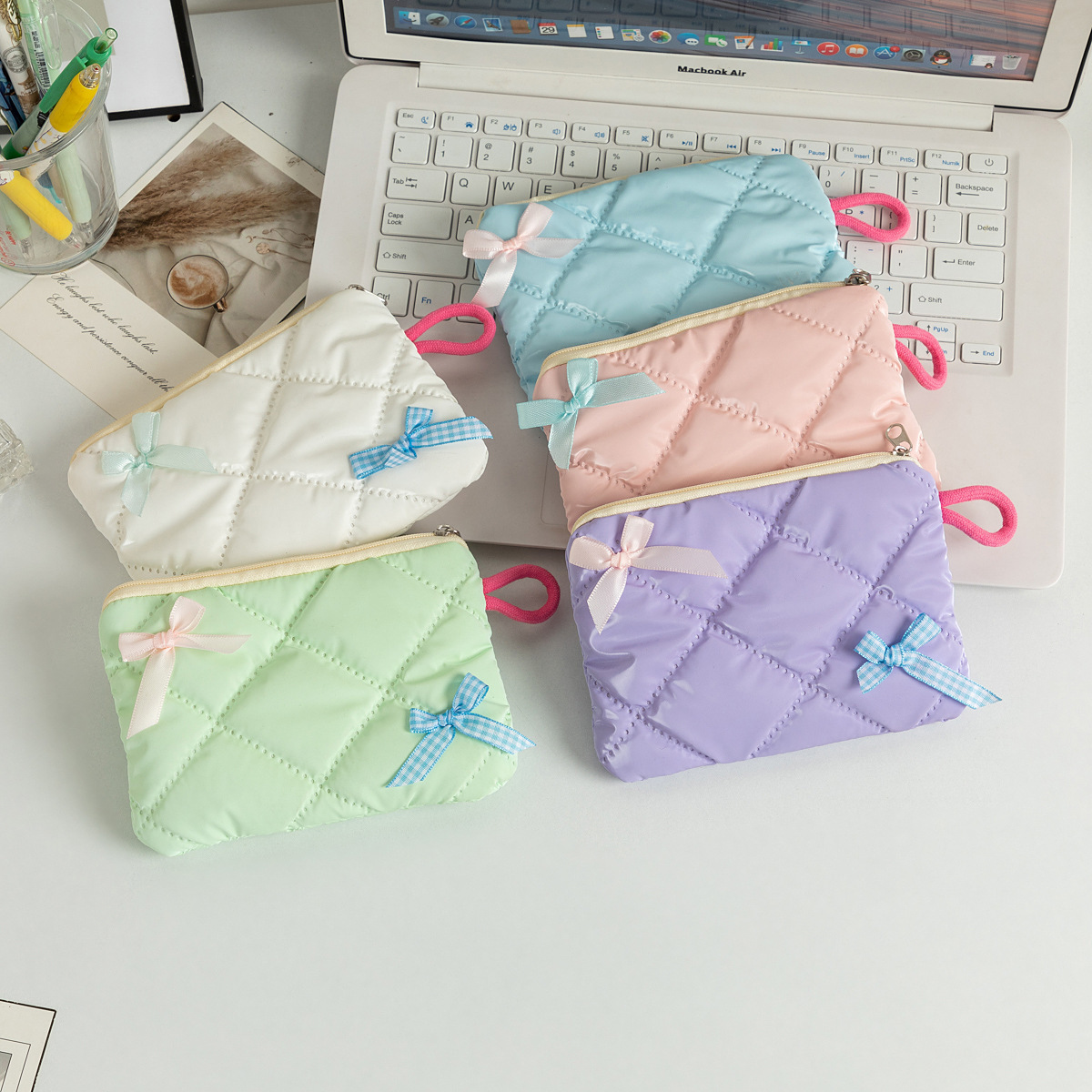 亮面蝴蝶結菱格收納包