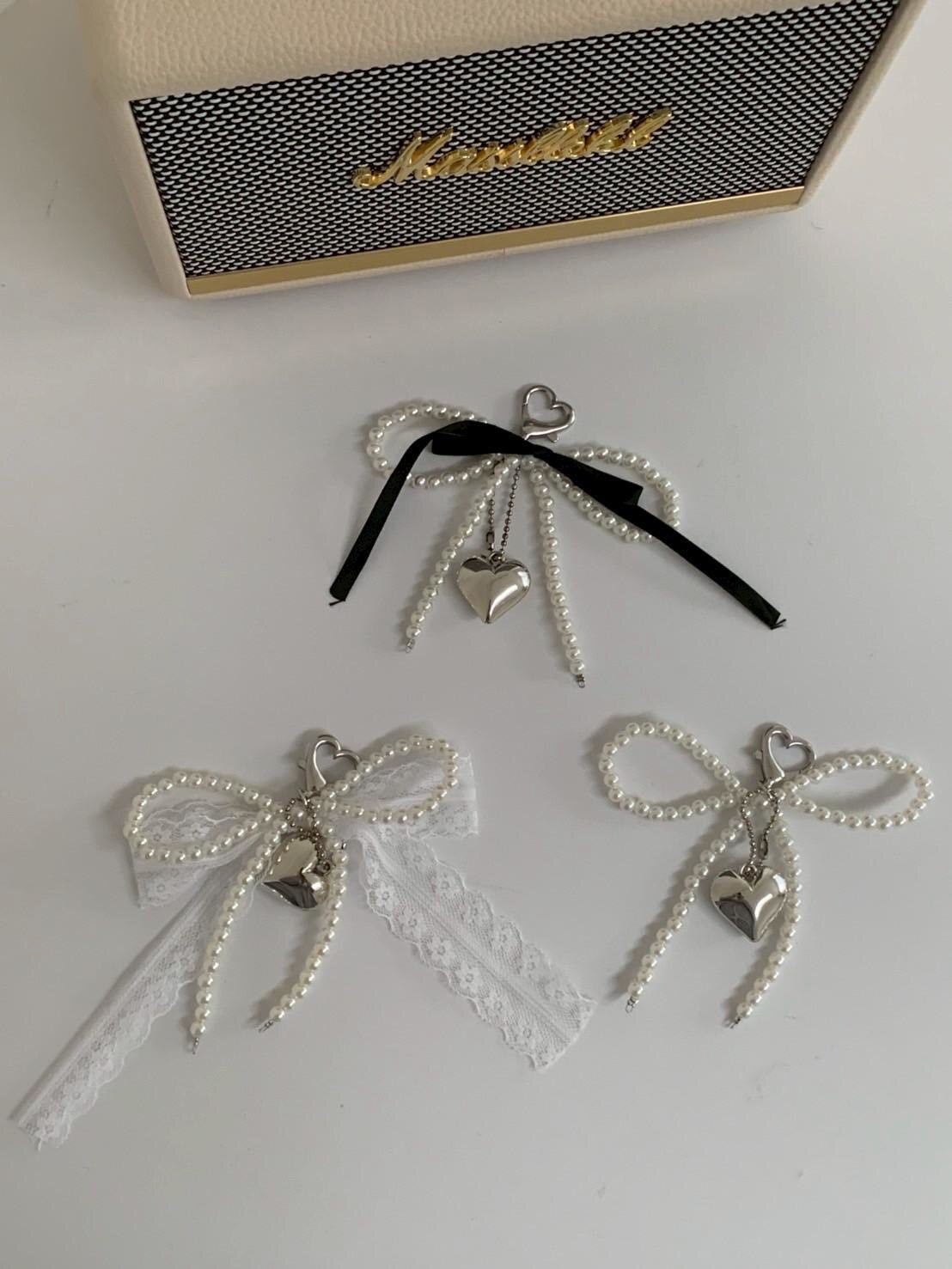 可可愛愛的愛心珍珠蝴蝶結吊飾