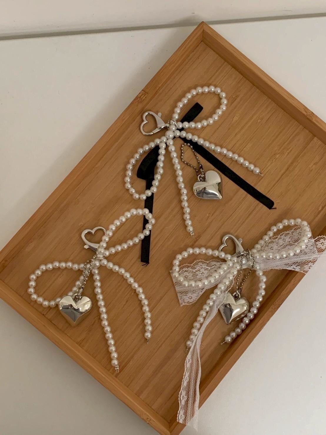 可可愛愛的愛心珍珠蝴蝶結吊飾