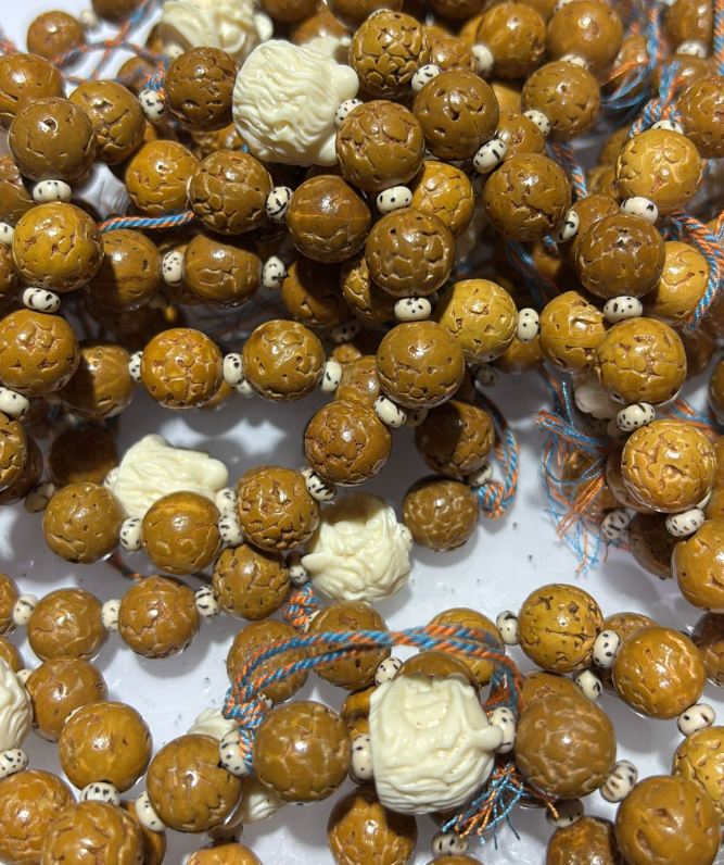 250822 - B68 10mm+無齒金剛菩提醒獅象牙果設計款手串