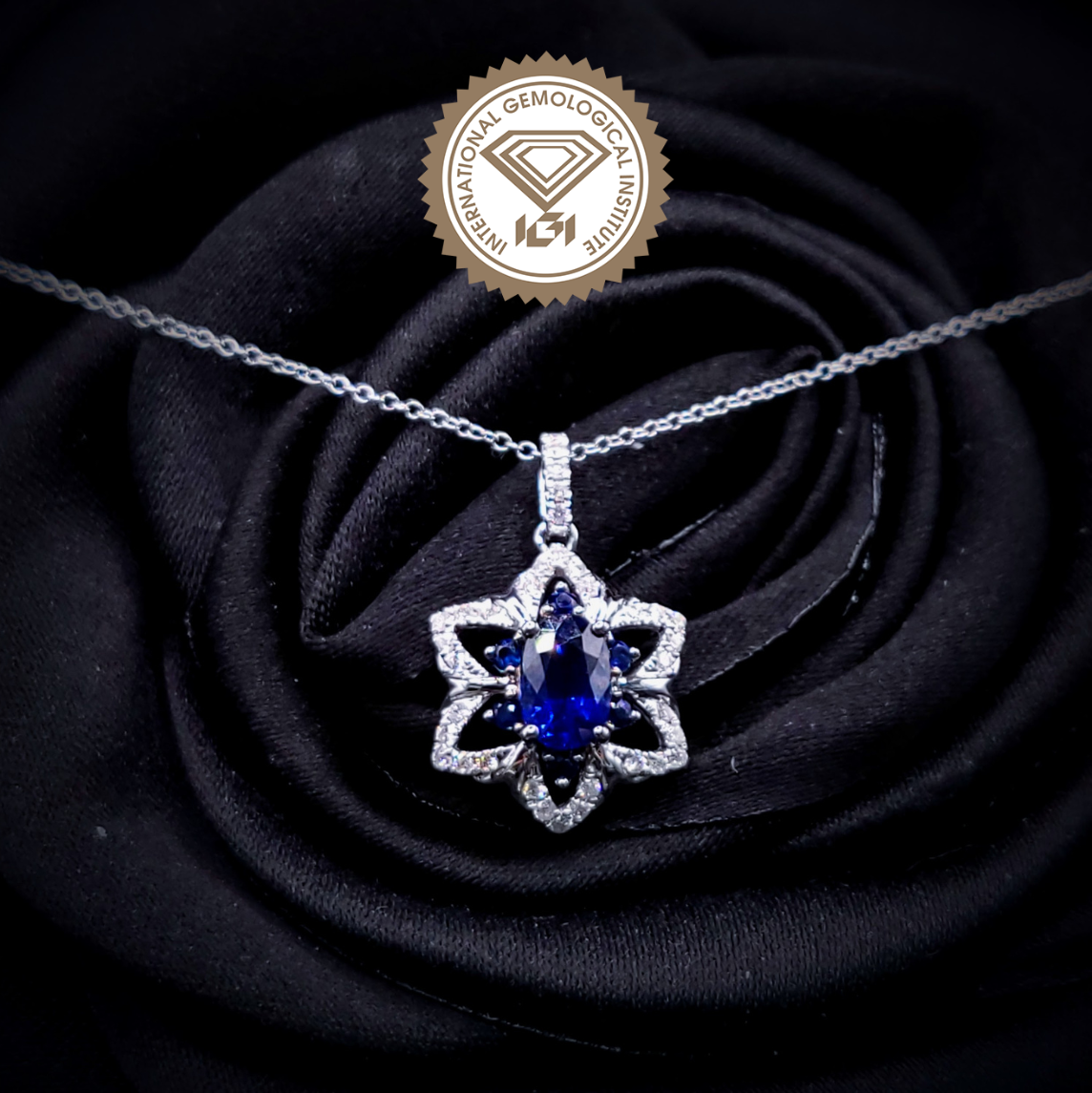 18K White Gold 0.97ct Sapphire and Diamond Pendent