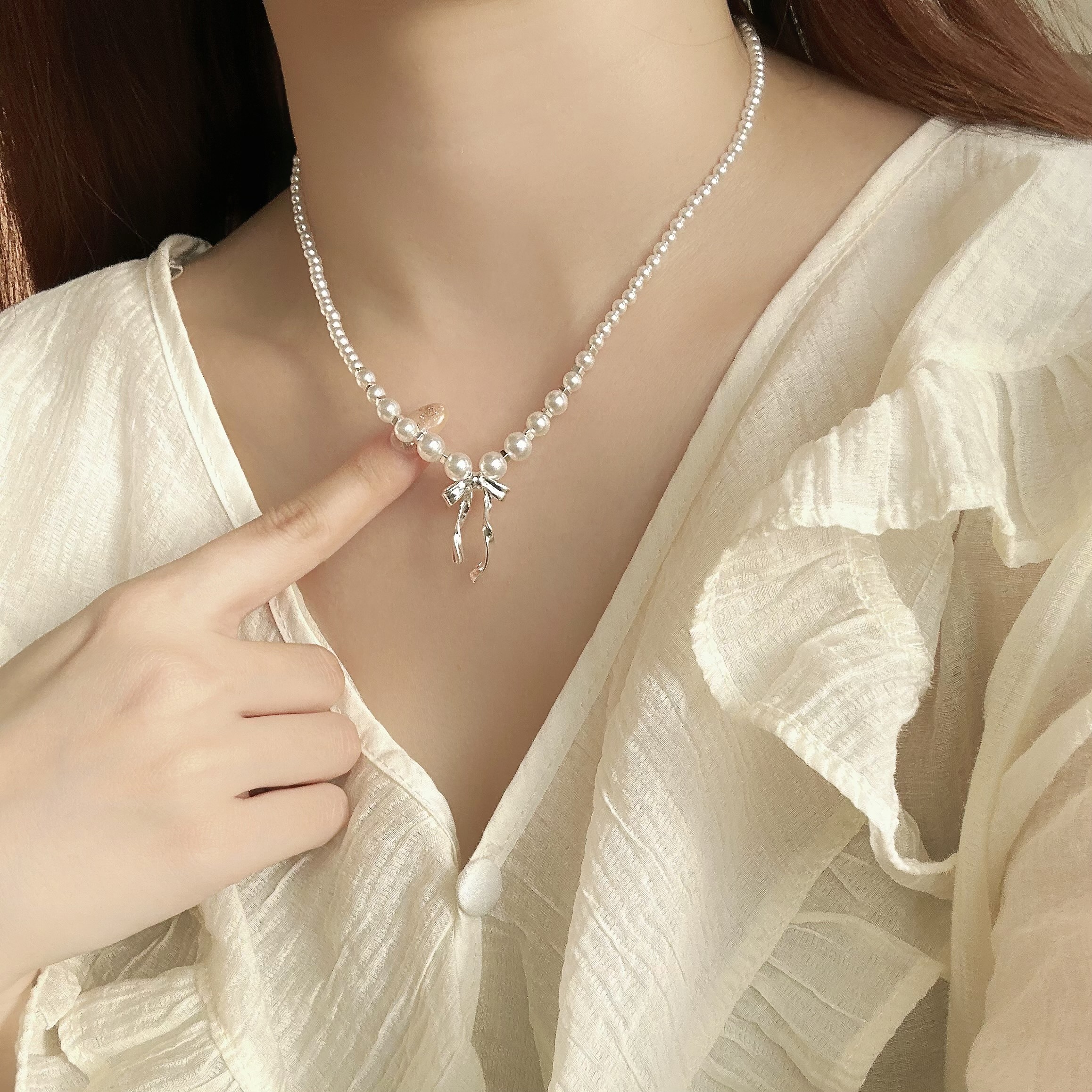 042珍珠蝴蝶結頸鏈