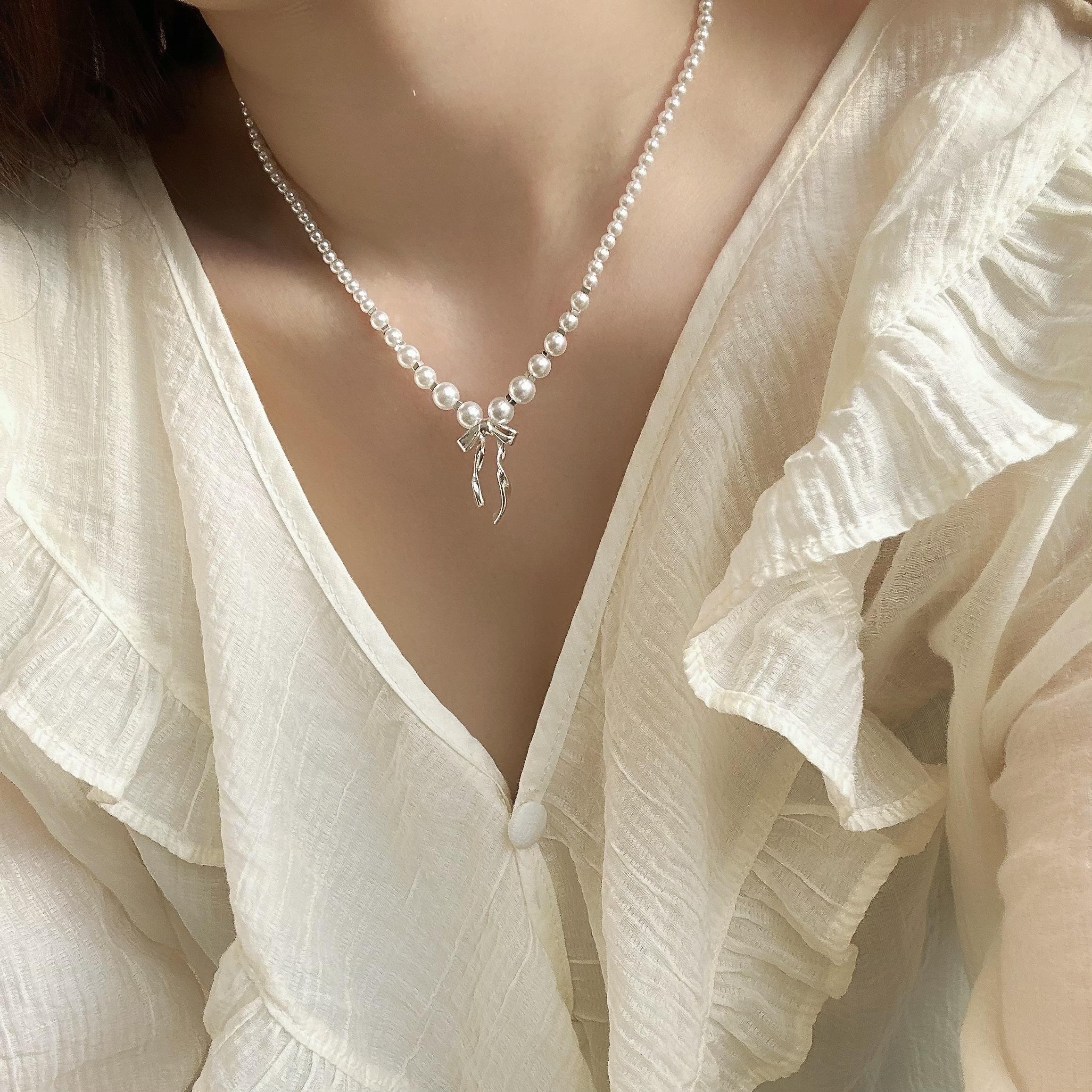 042珍珠蝴蝶結頸鏈