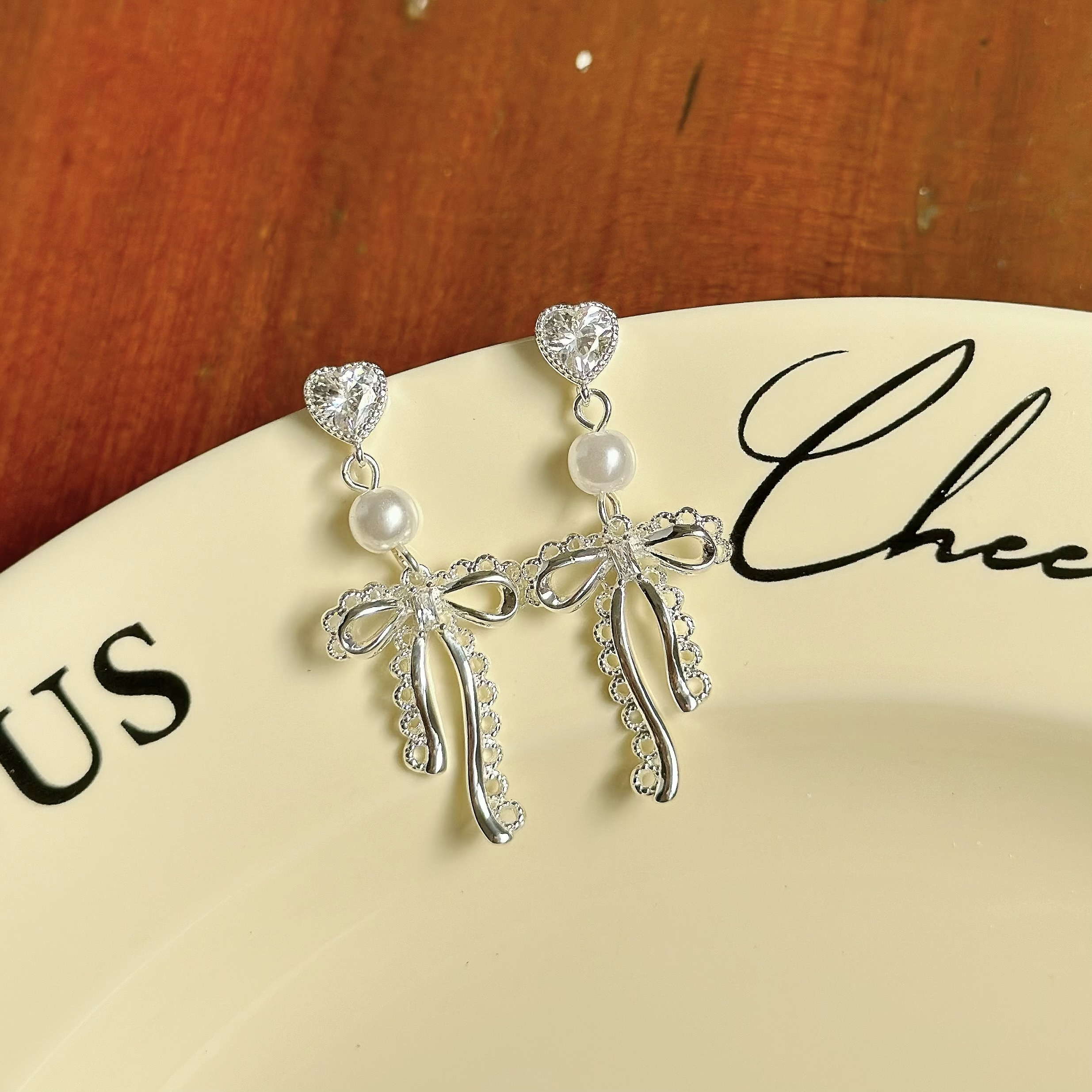 B561愛心珍珠蕾絲蝴蝶結垂吊