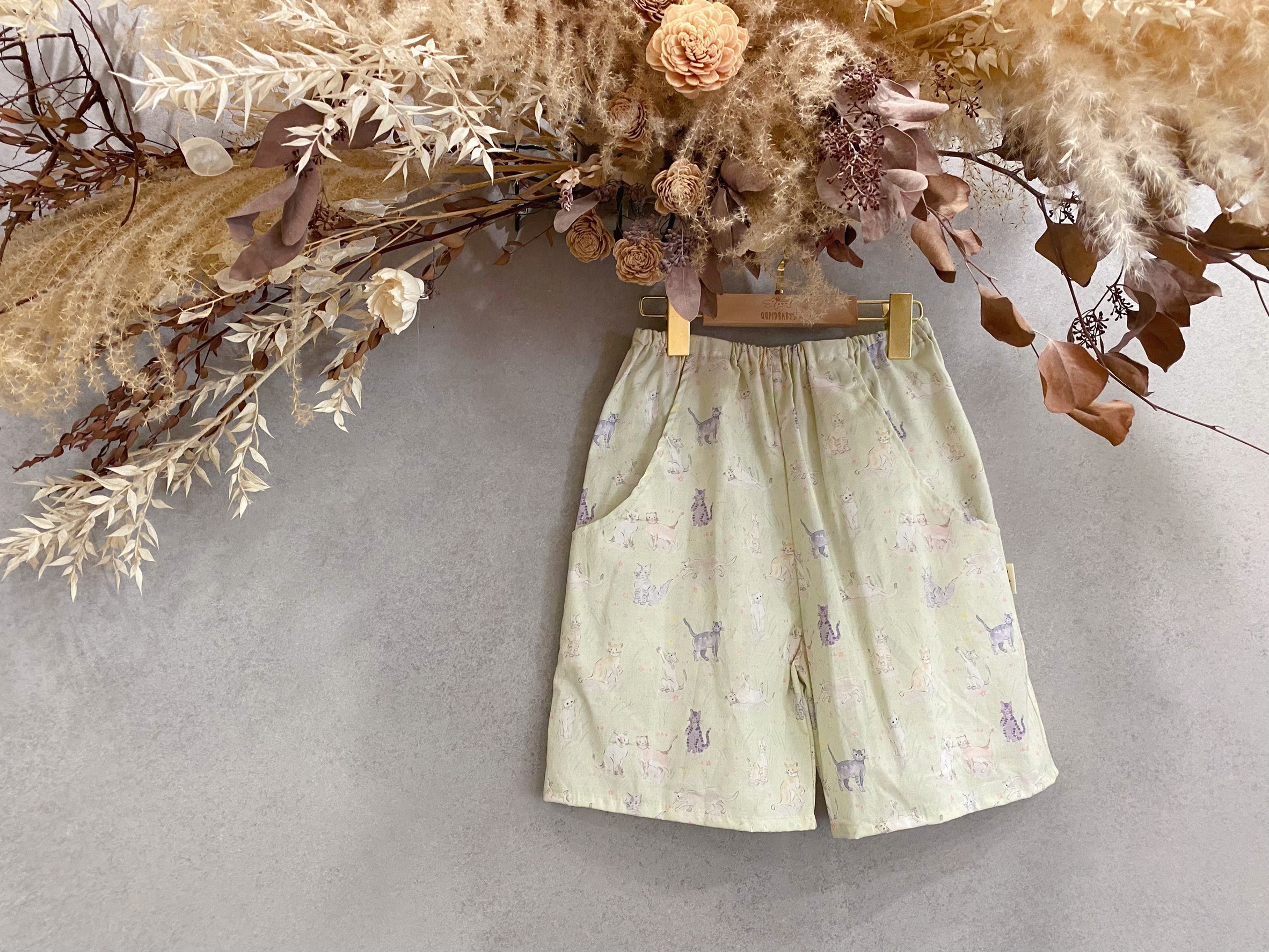 淺綠貓咪 口袋短褲（140）