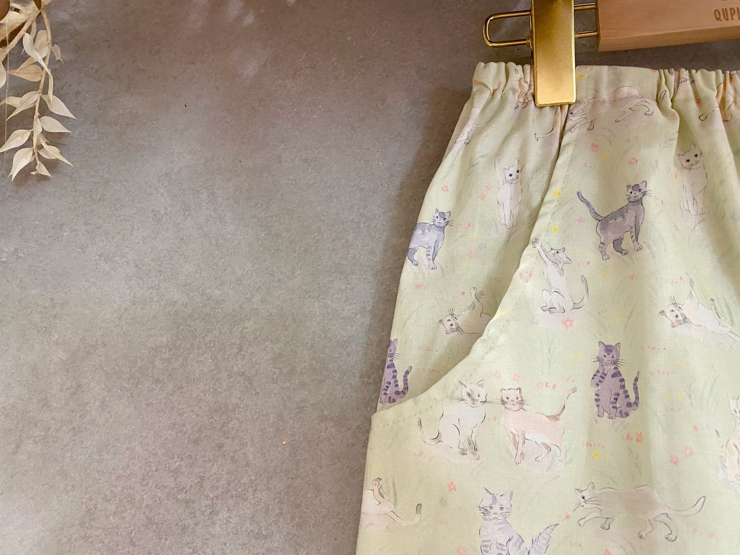 淺綠貓咪 口袋短褲（140）