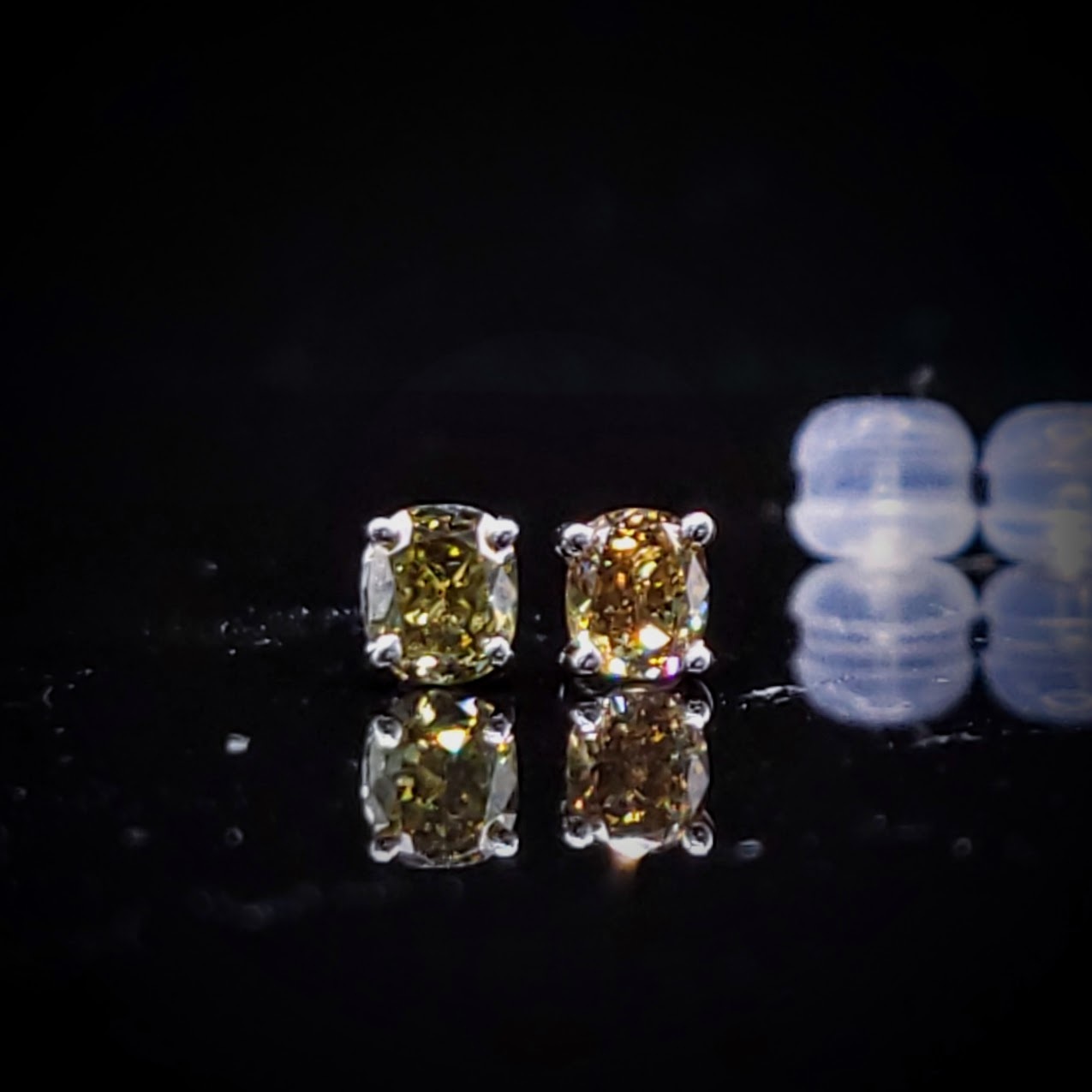 18K White Gold 0.56ct Fancy Green Oval Cut Diamond Earrings