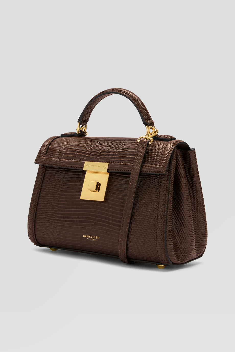 DeMellier｜PARIS 真皮壓紋飾邊梯形手拿包