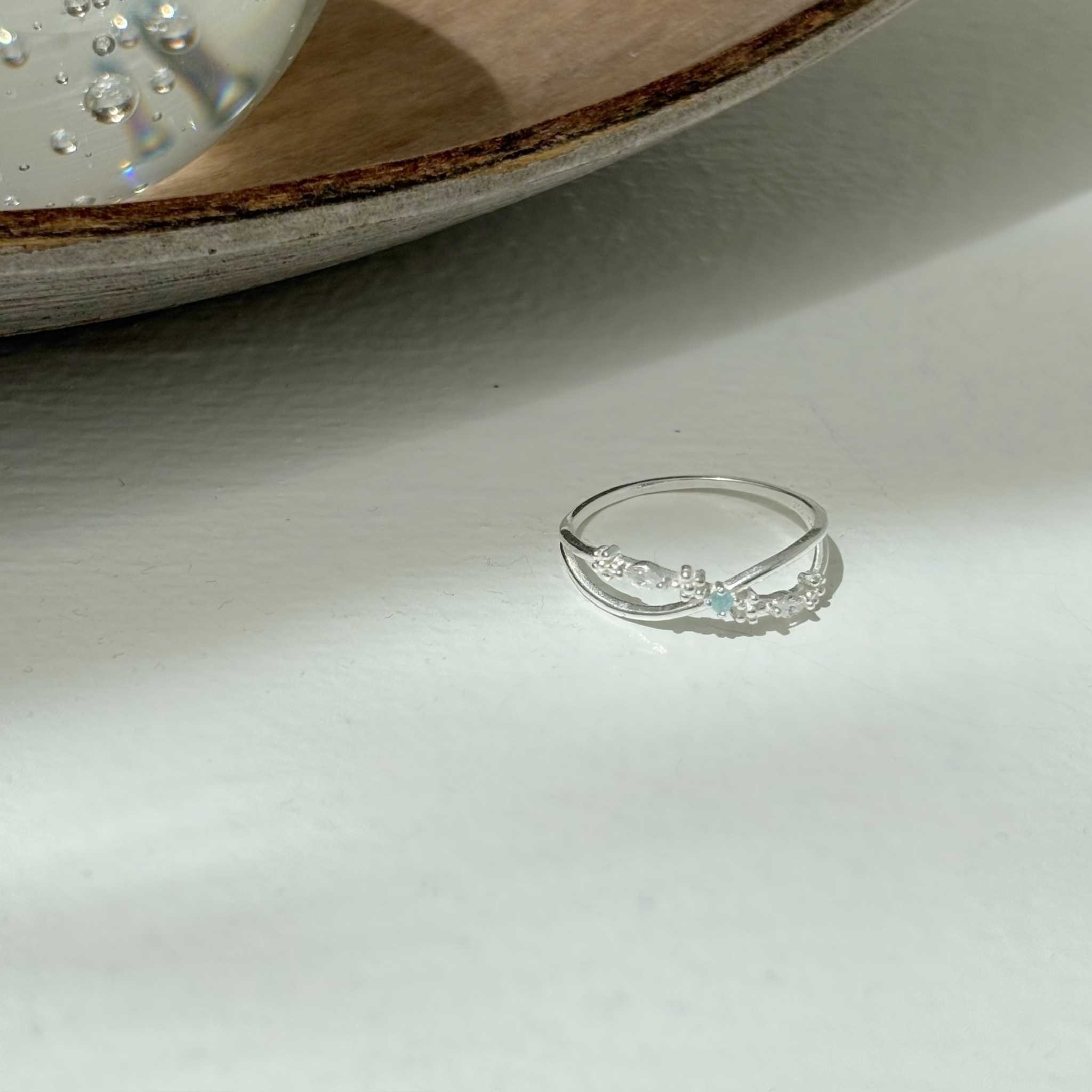 交織碎花藍鋯石戒指