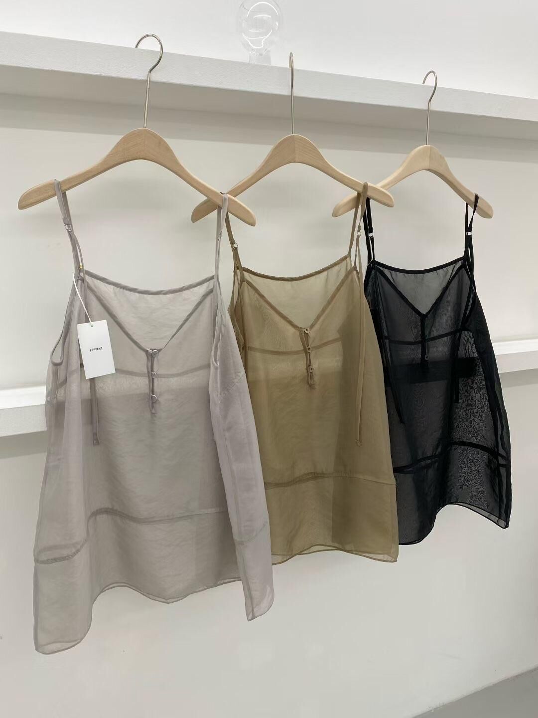 See through little button bustier