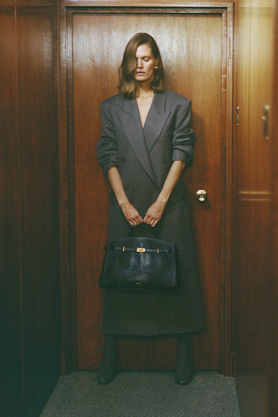 DeMellier｜HUDSON 真皮壓紋金釦梯形手提包