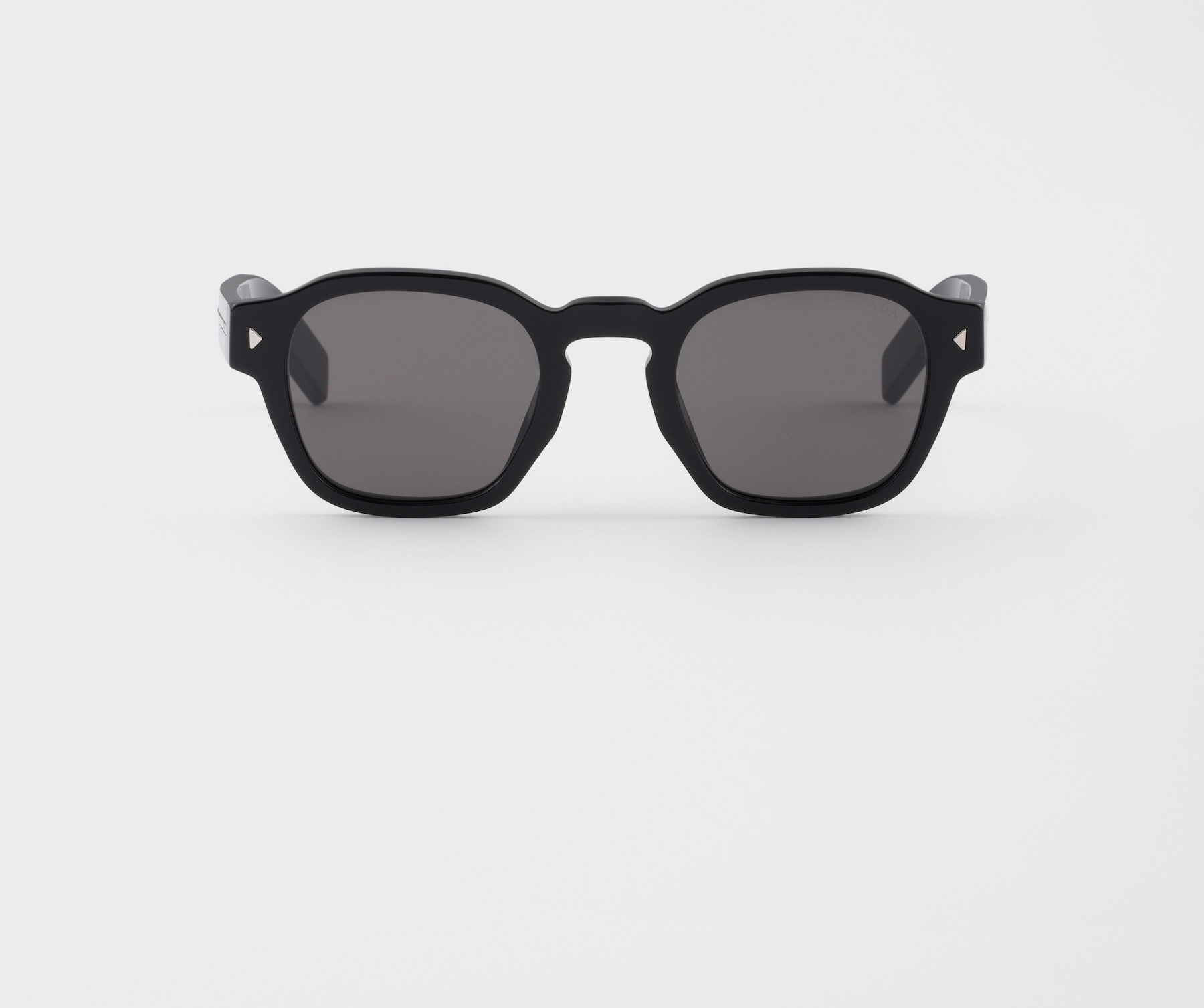Prada sunglasses with the iconic metal plaque