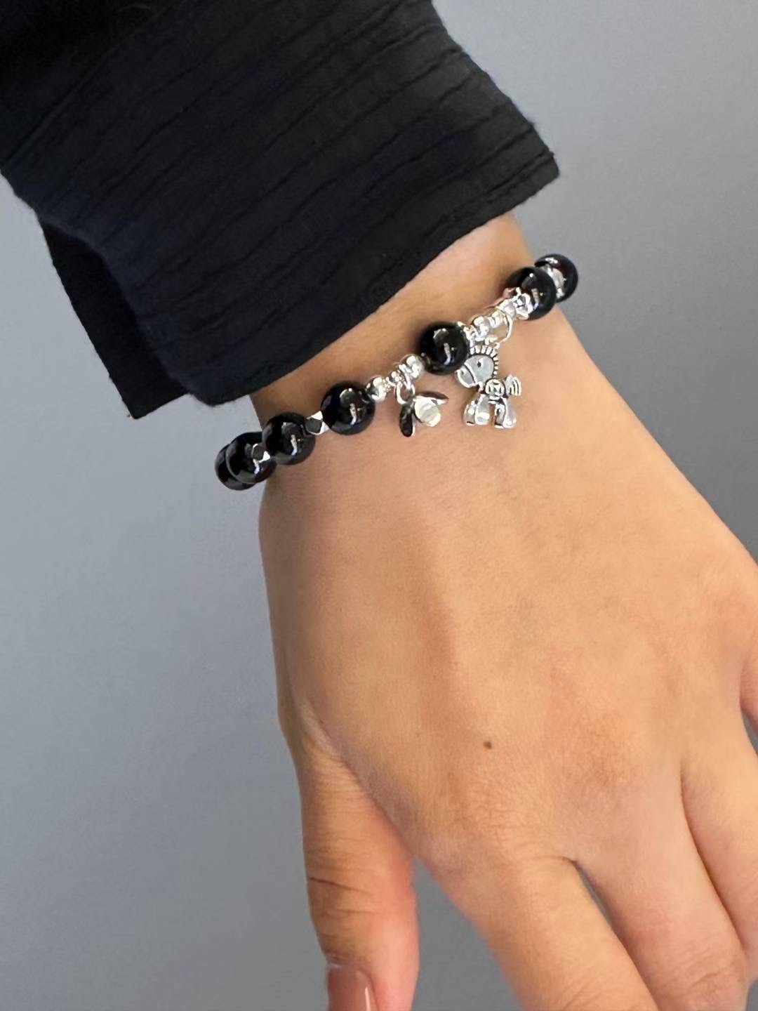 UA25黑瑪瑙銀球有錢花手鏈925