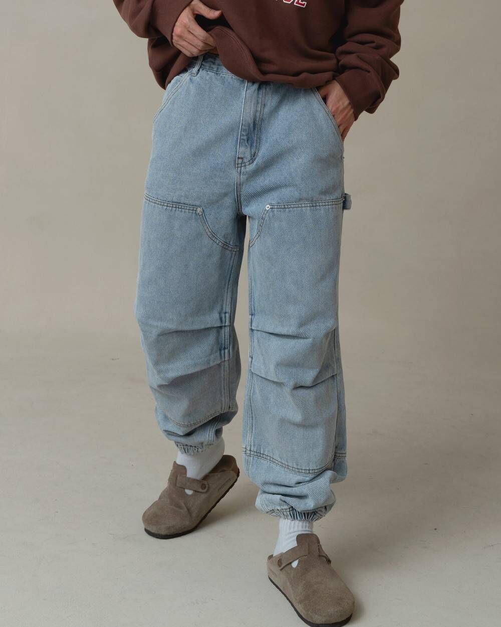 (韓國獨家特價)縮口細節慢跑牛仔褲