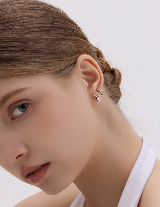 閃耀交錯小星。夾式耳環(銀)