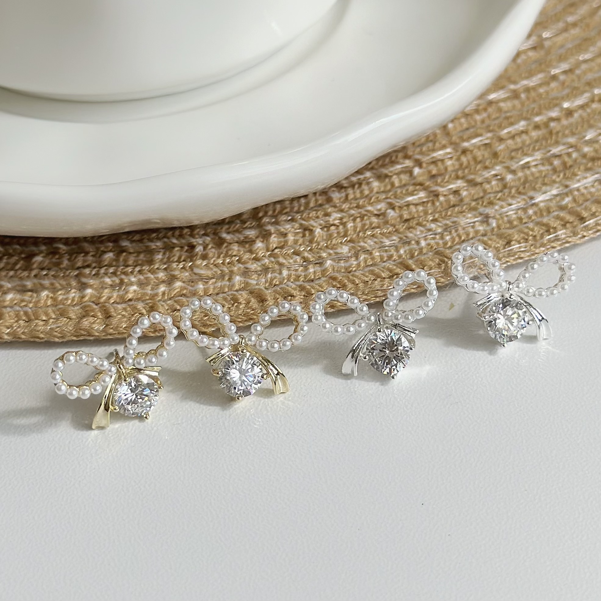 B333珍珠蝴蝶結鋯石耳針