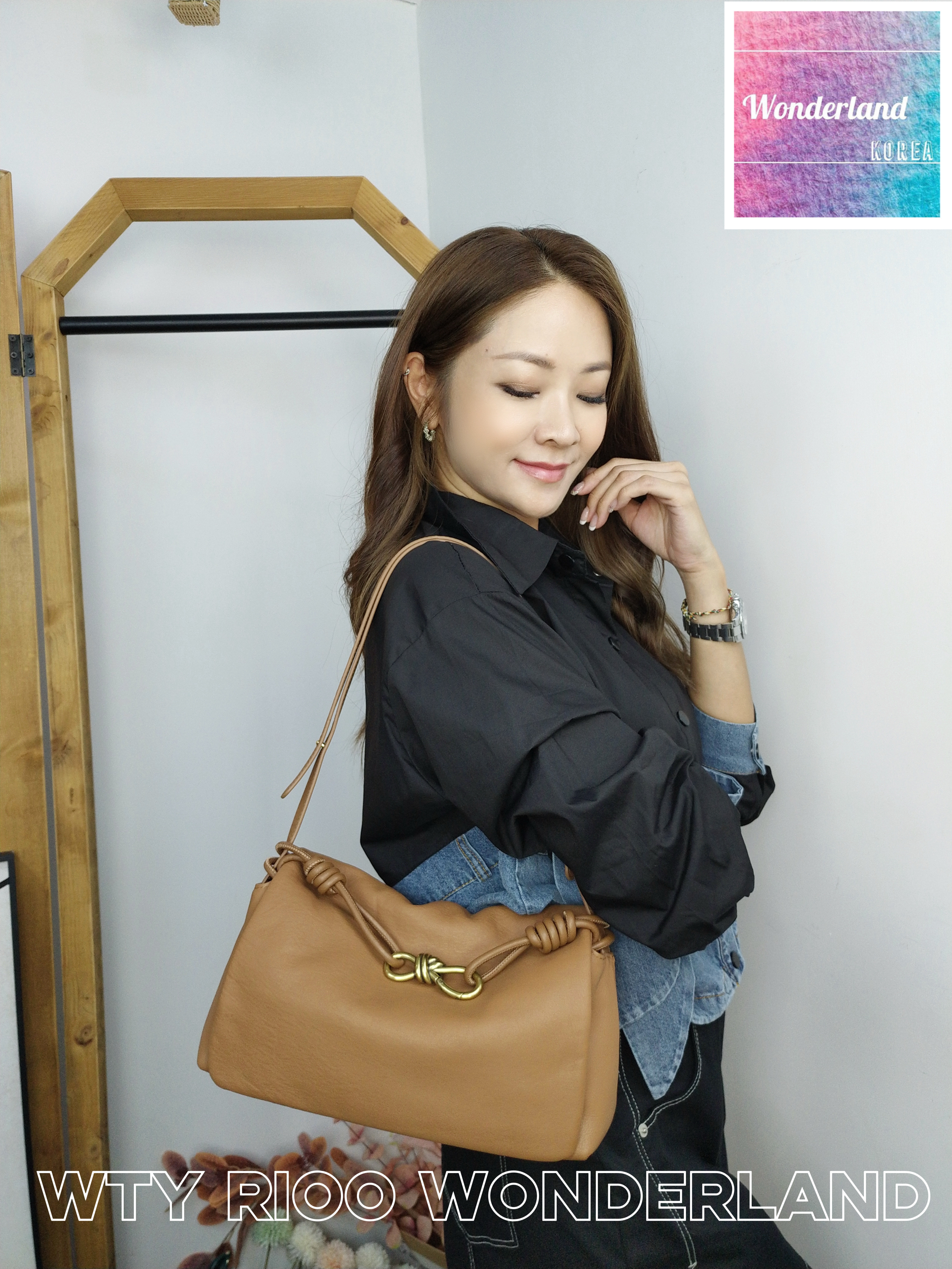 A10 W090910紐結真皮包包