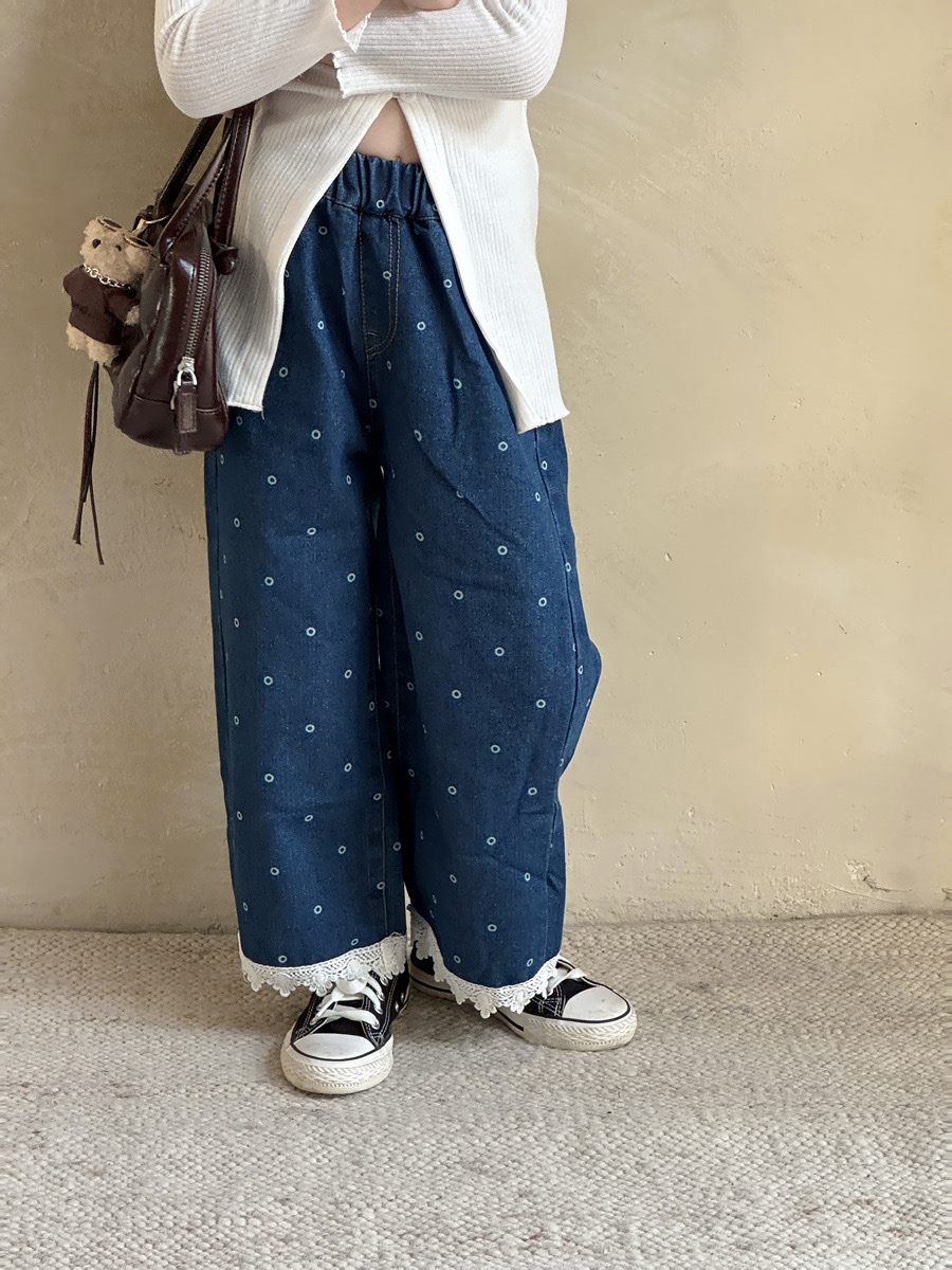 鬆緊圓點拼接蕾絲牛仔褲