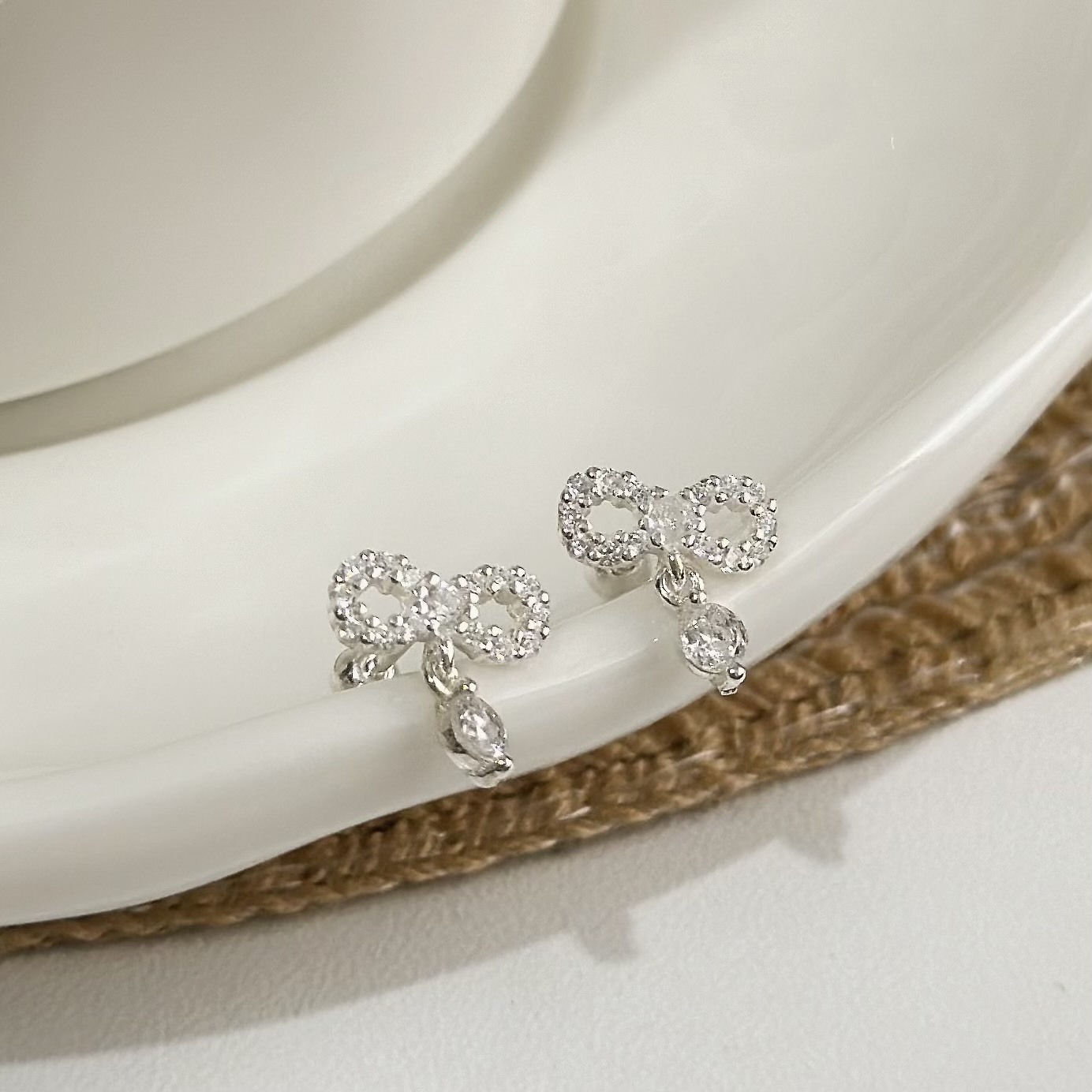 K173排鑽鏤空蝴蝶結小垂吊純銀鎖針