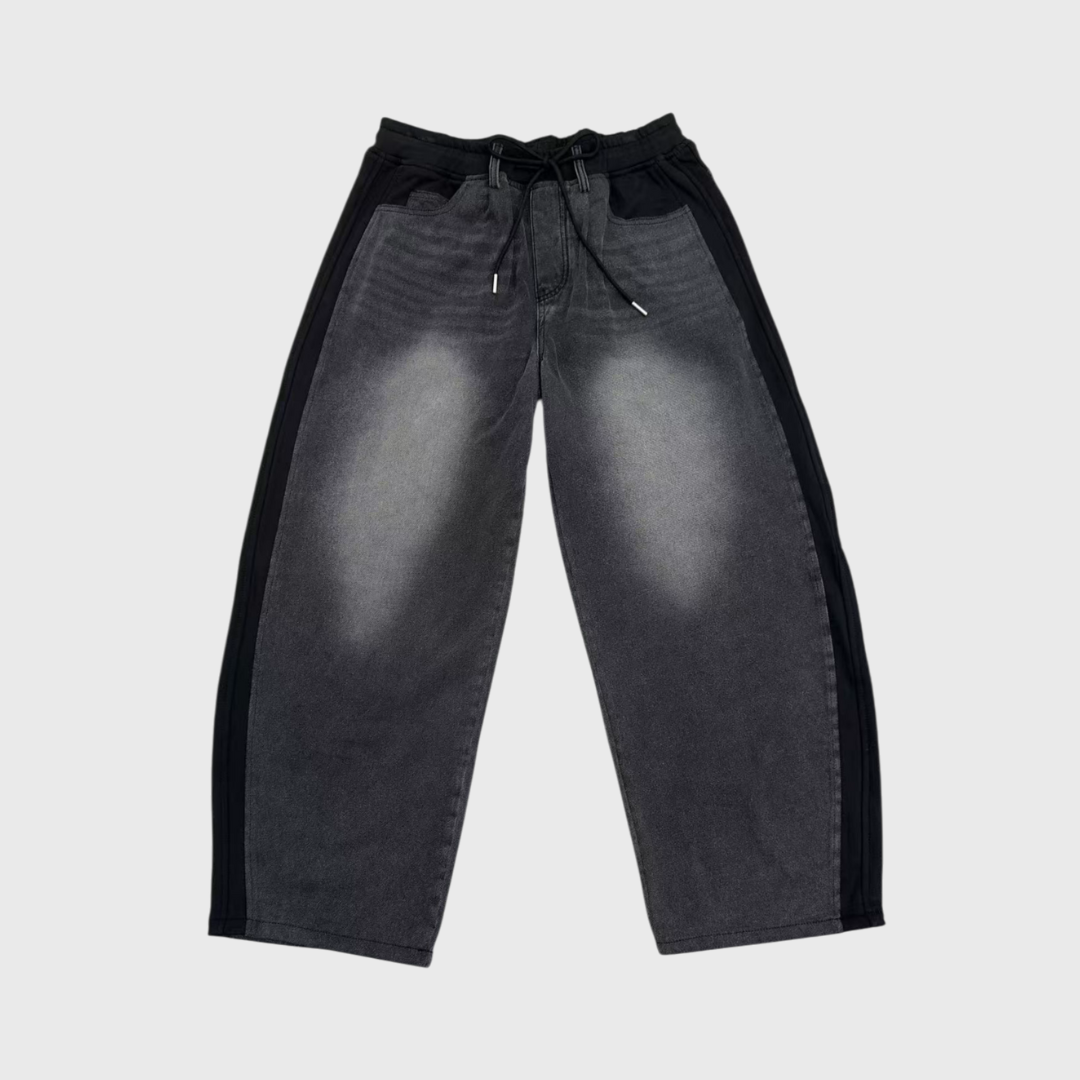 拼接設計彎刀牛仔褲