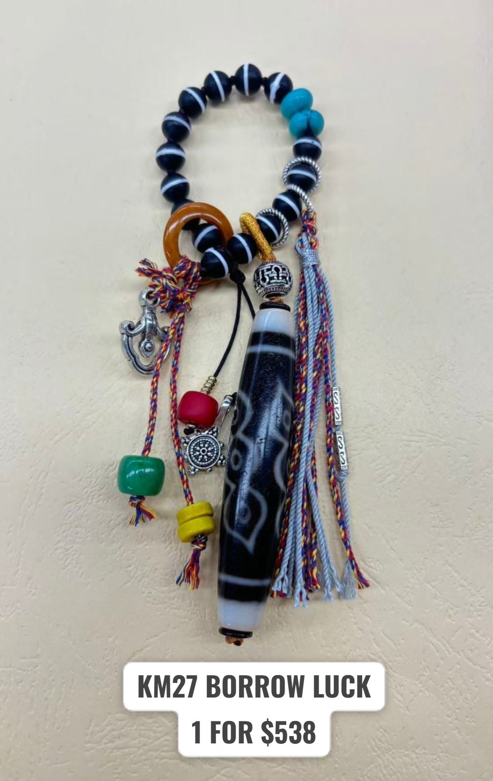 1 KM27 BORROW LUCK CHARM