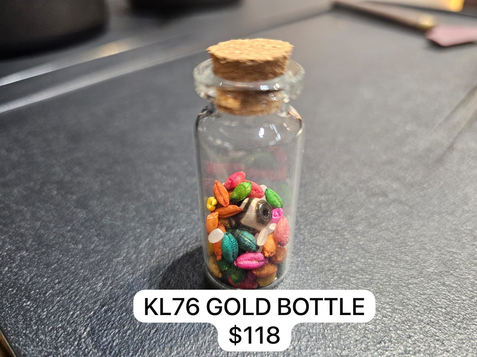1 KL76 GOLD BOTTLE