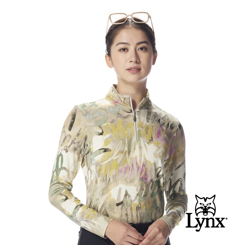【Lynx Golf】女款歐洲進口面料柔軟舒適圓領拉鍊滿版草寫印花長袖高爾夫球衫