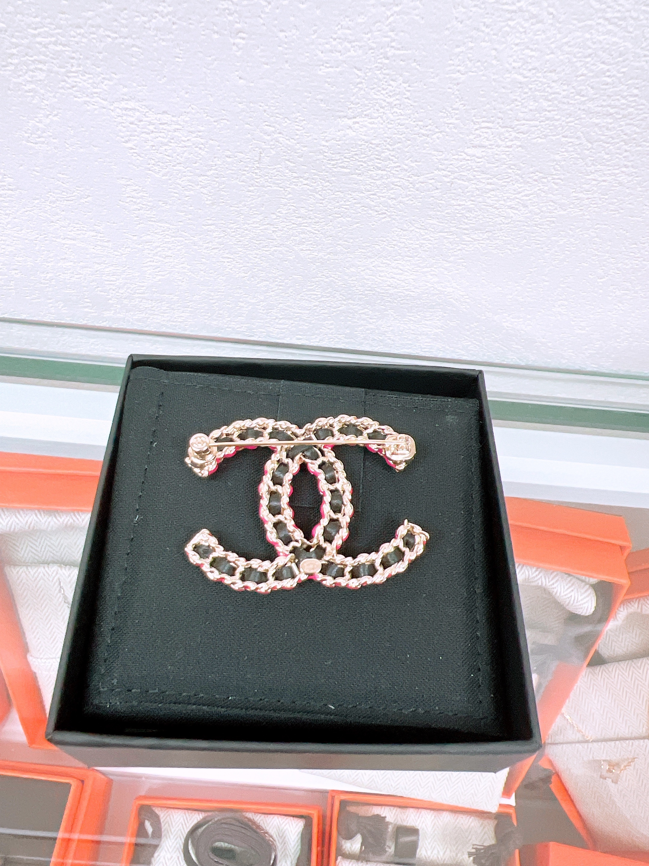 Chanel 23b brooch black leather