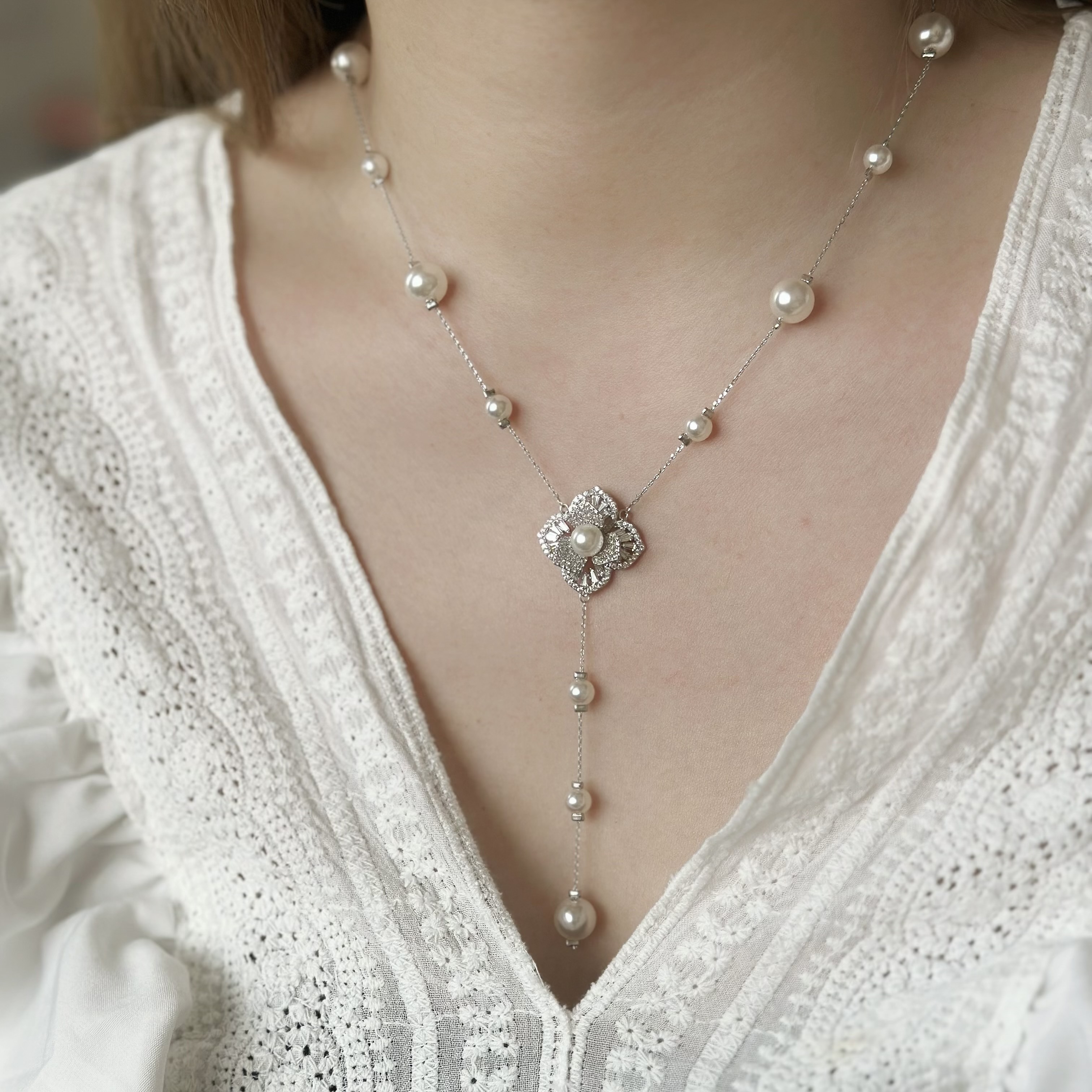 D81珍珠鋯石花朵y字鏈