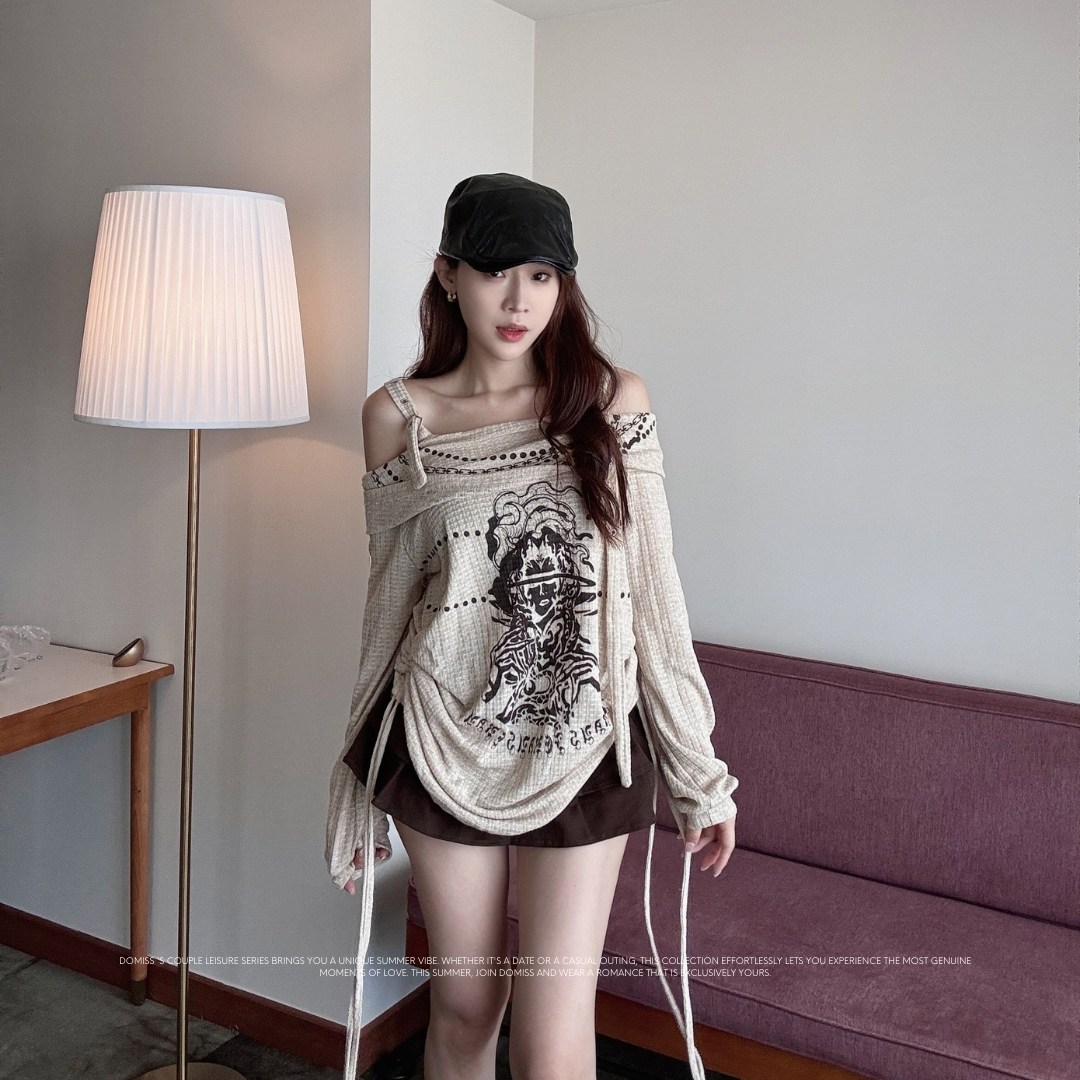 【酷辣印花上衣】DOMISS落肩鏤空設計 率性印花 寬鬆上衣 針織衫 隨性感-2色