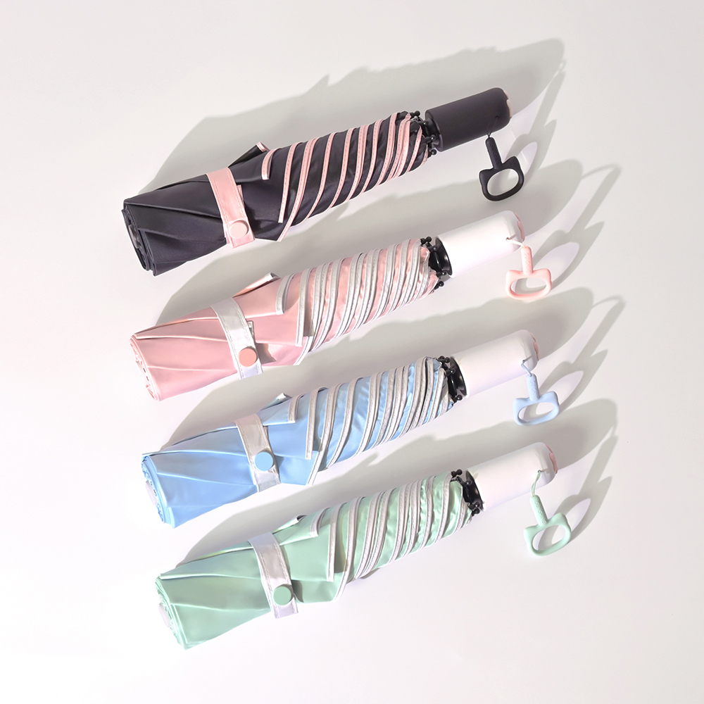 展示4把收合的防曬輕收貓印自動傘