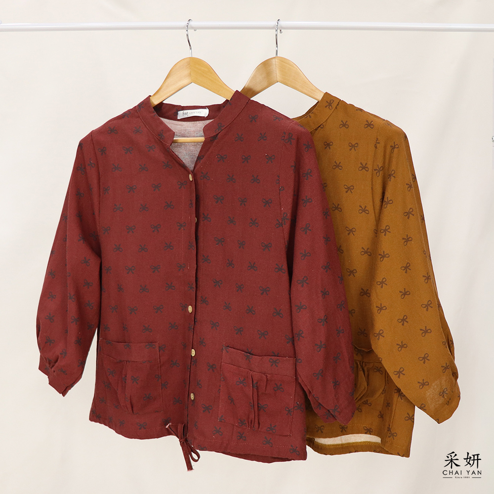 蝴蝶結印花排扣V領長袖上衣