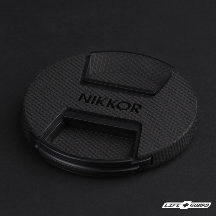 Nikon Z 24-70mm F2.8 S II 鏡頭蓋貼膜展示圖，LIFE+GUARD 風格