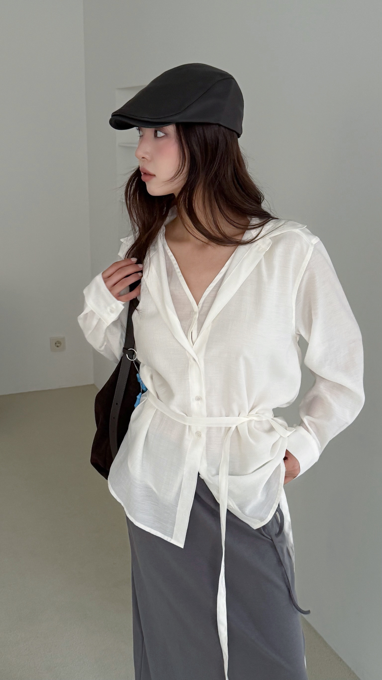 可調節皮革小偷帽(黑/棕)