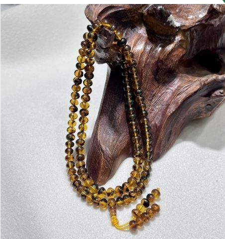 zc1701  抚顺药珀佛珠6mm-8mm