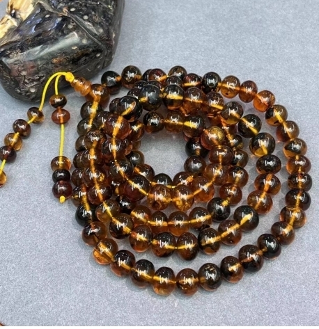 zc1704  抚顺药珀佛珠9mm