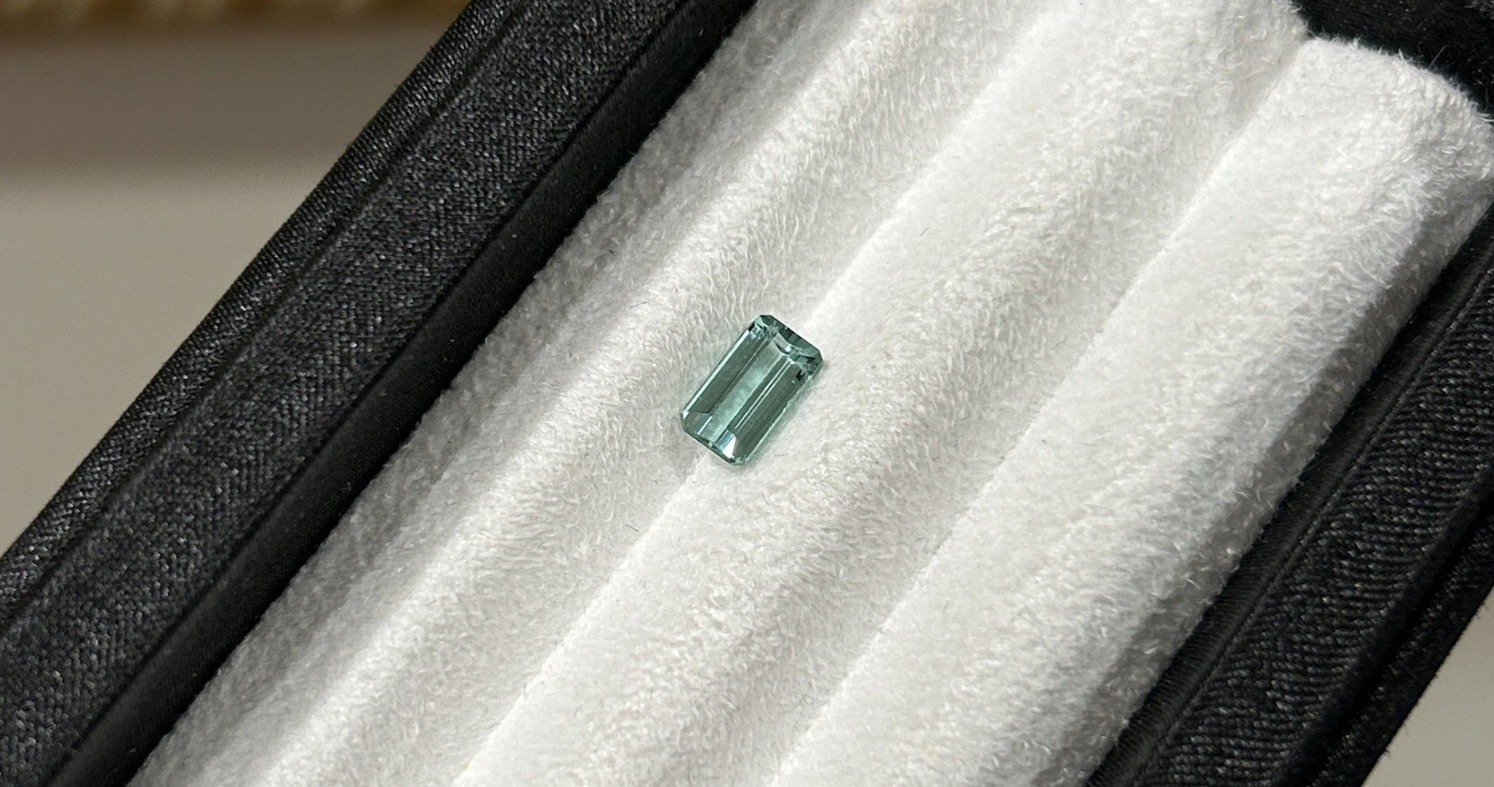 A 0.98ct emerald cut tourmaline in tiffany blue.