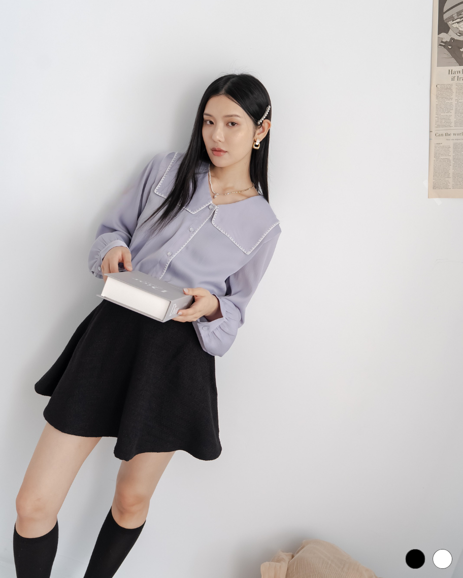 少女感毛呢鈕扣短裙