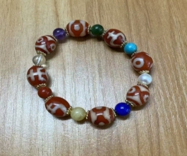 KKDU250620801    红肉多宝手串