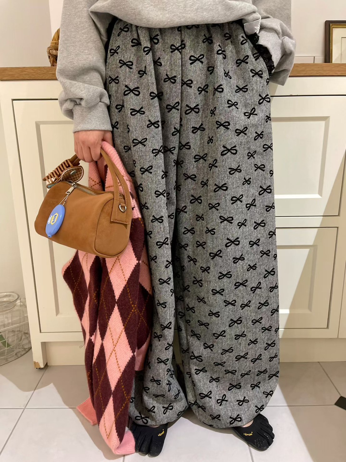 黑色滿滿蝴蝶結休閒長褲