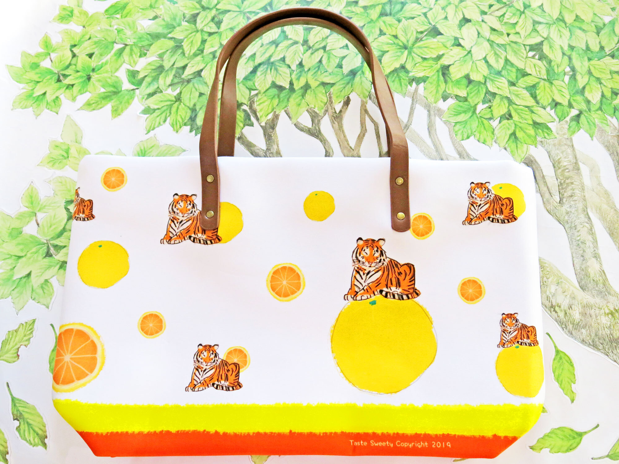 笑眼柑橘虎側背包