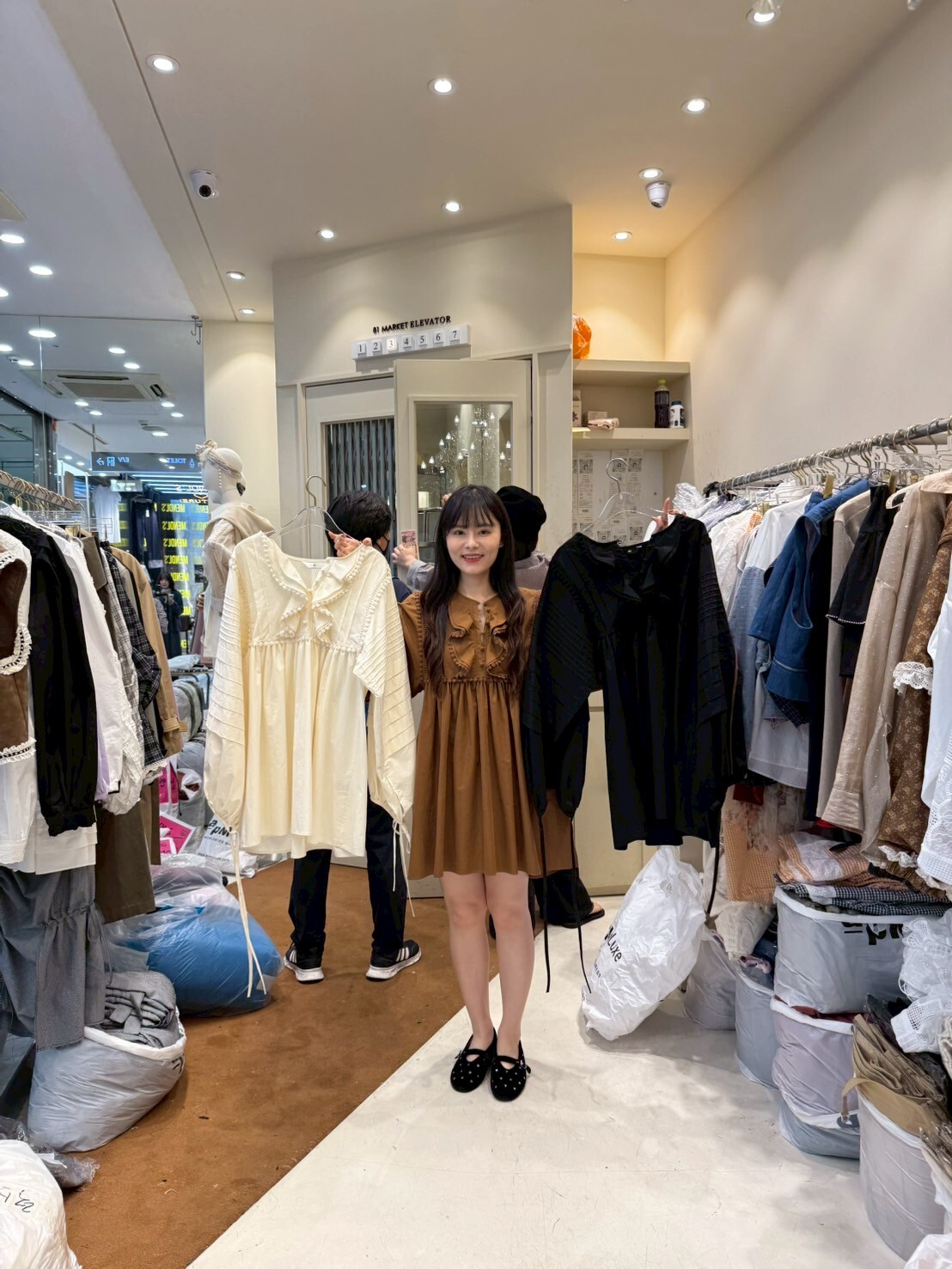 EM5002 荷葉波波邊疊層壓摺上衣