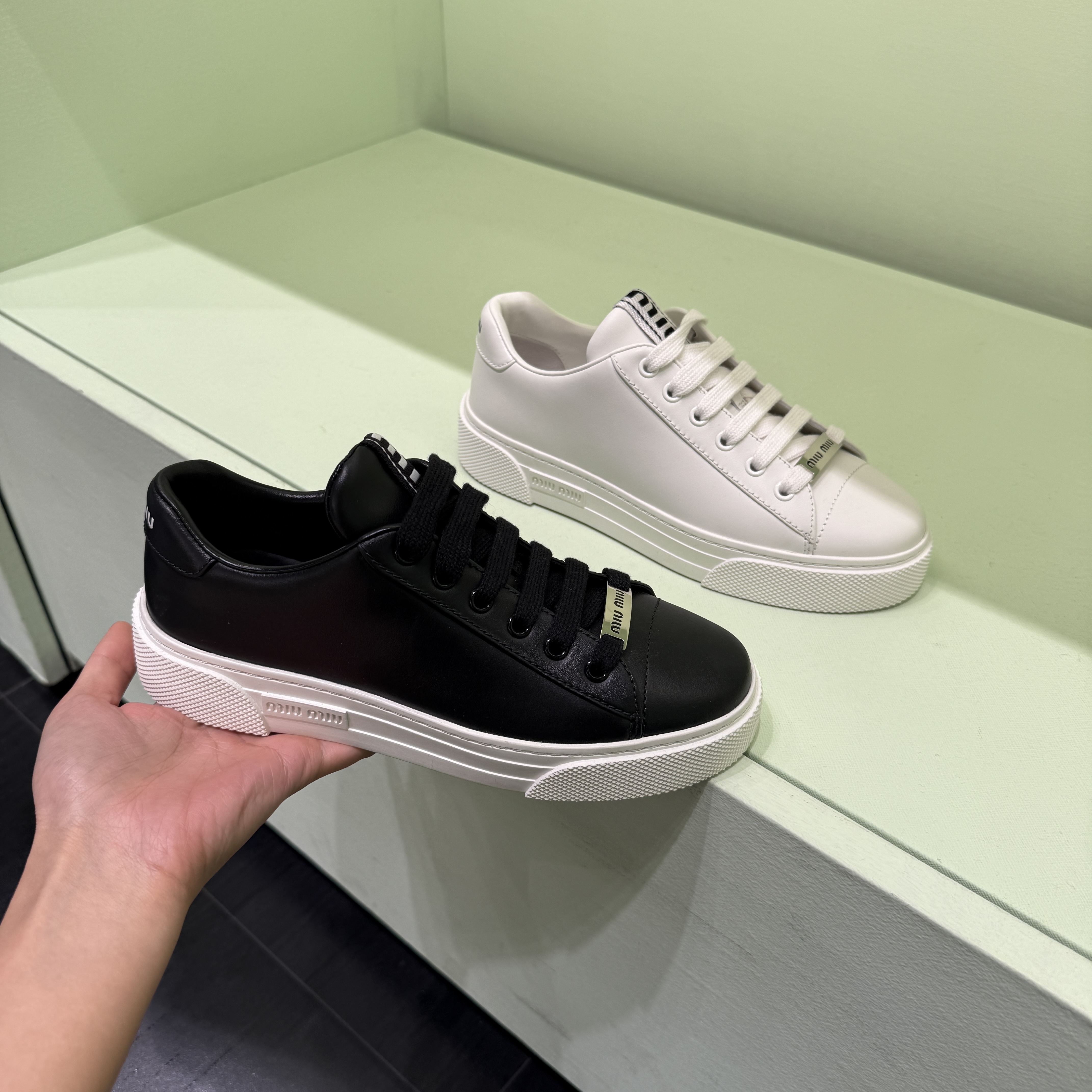 Miumiu Metal logo lace up leather sneakers black white 5E165D